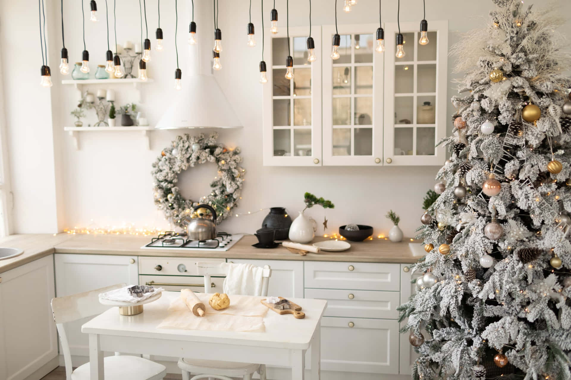 White Kitchen With White Decorated Tree Christmas Teams Background