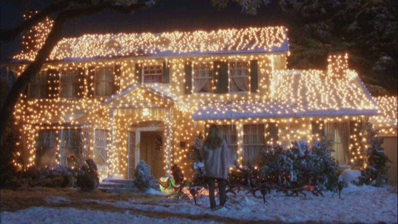 Jullovgriswold-huset Med Ljus. Wallpaper