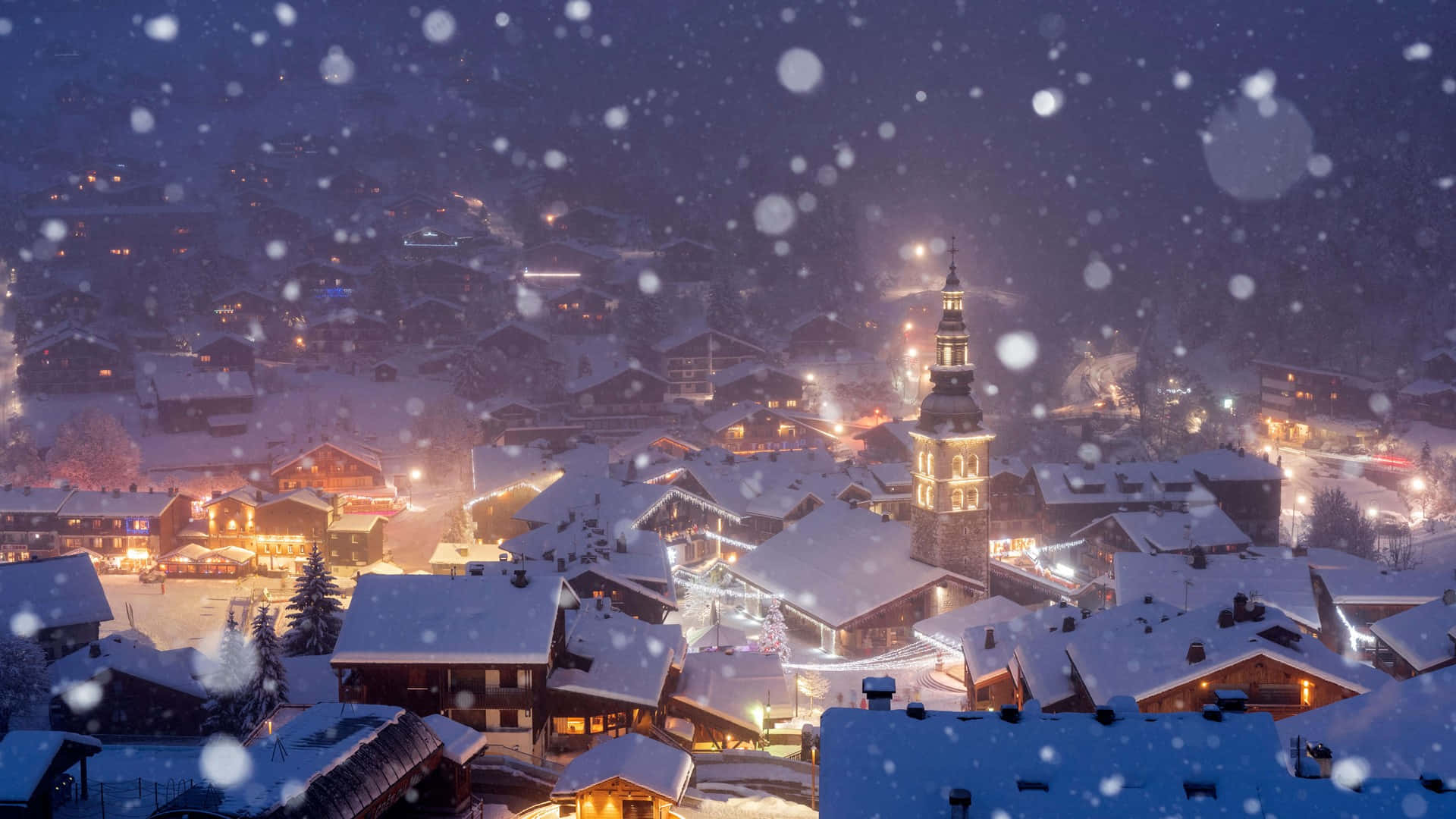 Enjoy the holiday season with a visit to a festive Christmas Village. Wallpaper