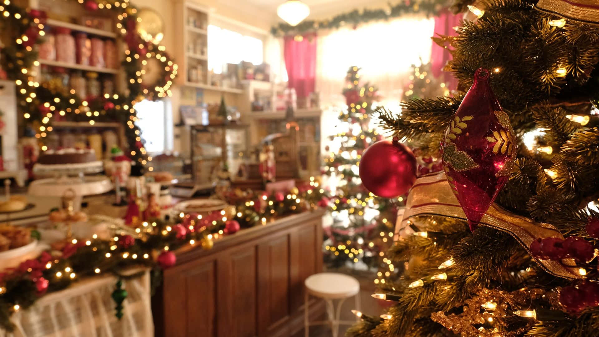 A Christmas Tree In A Shop With Decorations