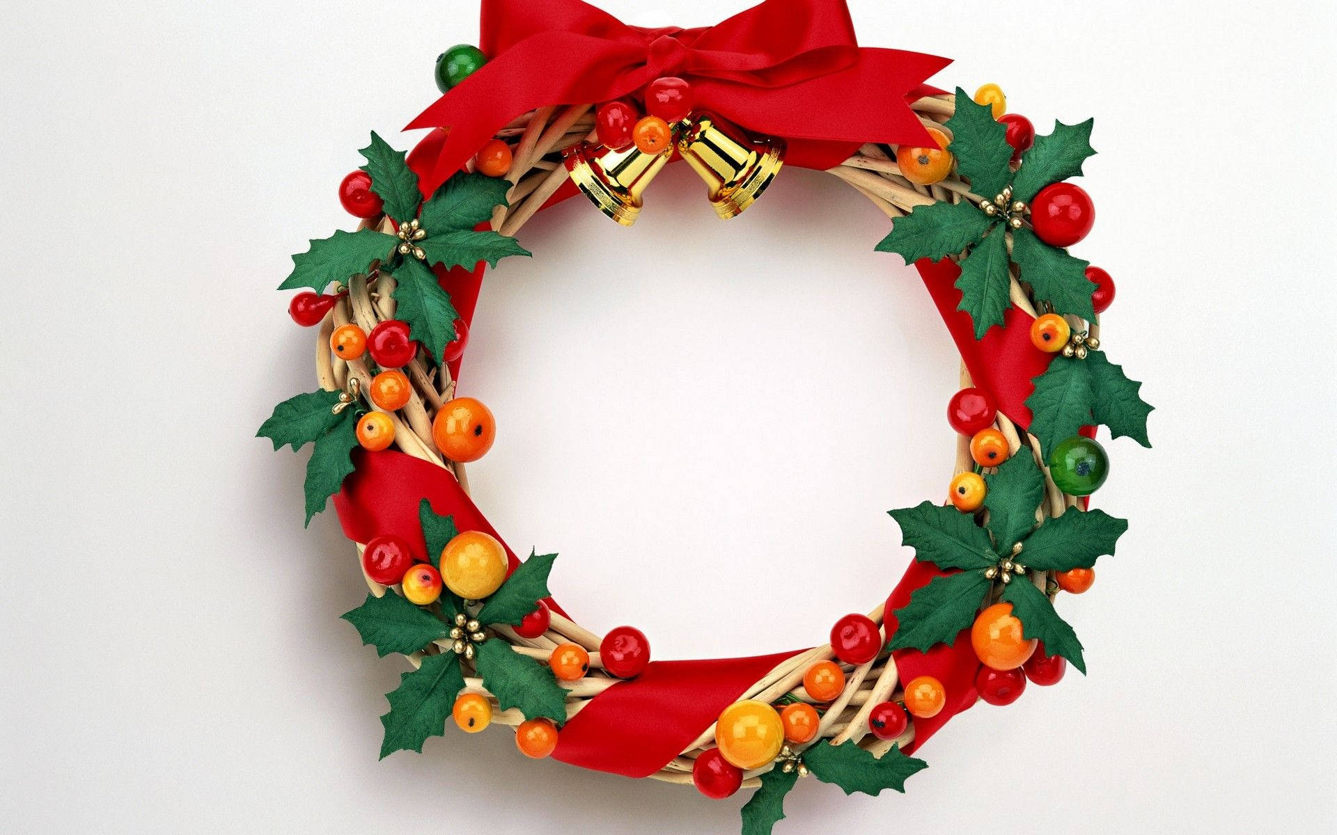 Christmas Wreath Tied With Red Ribbon Wallpaper