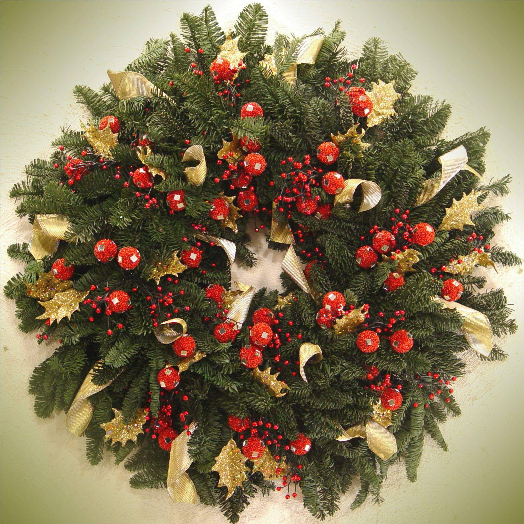 Christmas Wreath With Gold Ribbons Wallpaper