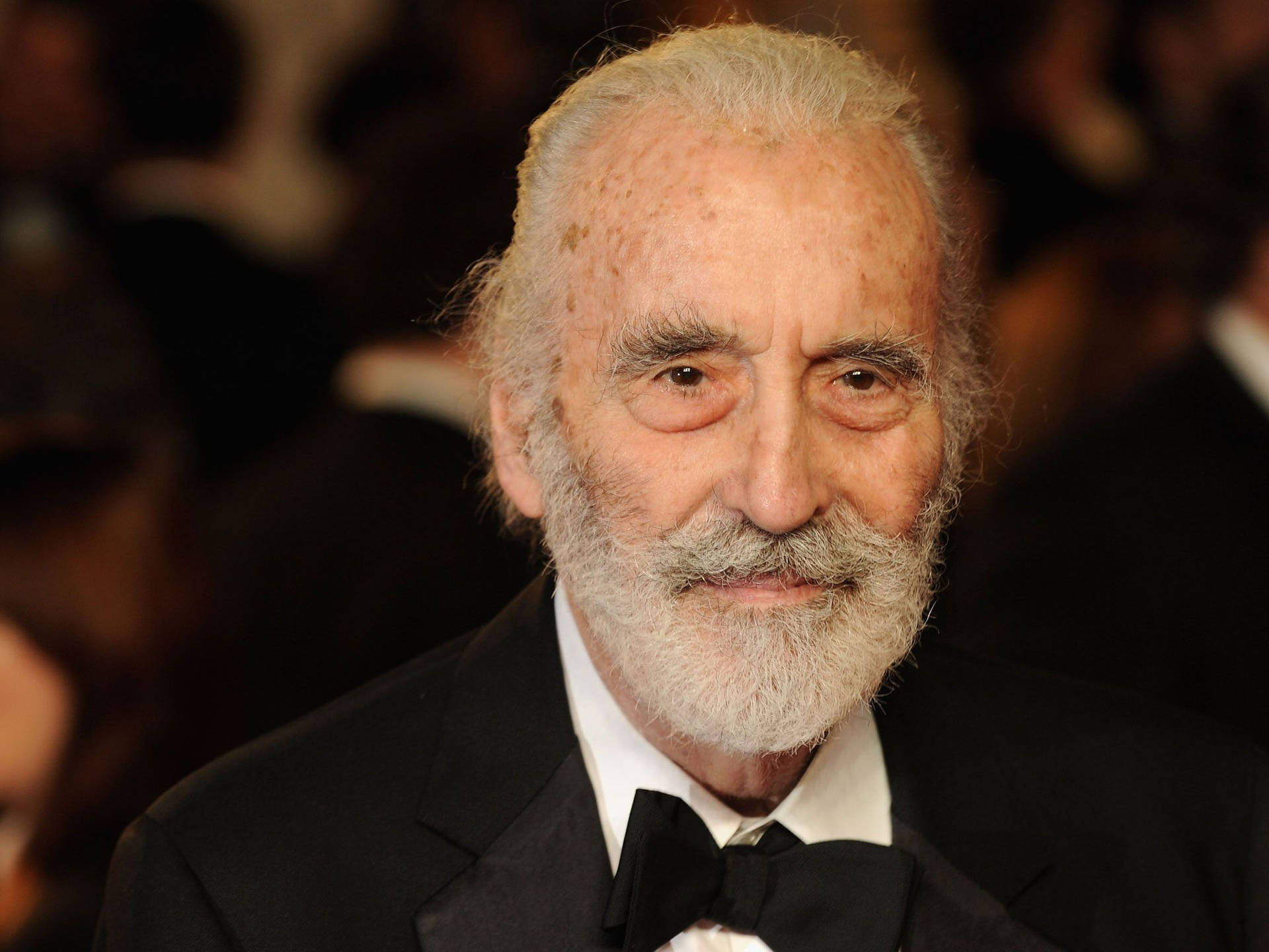 Christopher Lee Serious Look Background