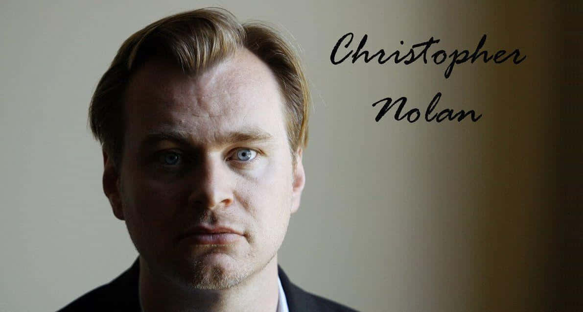 Christopher Nolan deep in thought on set Wallpaper