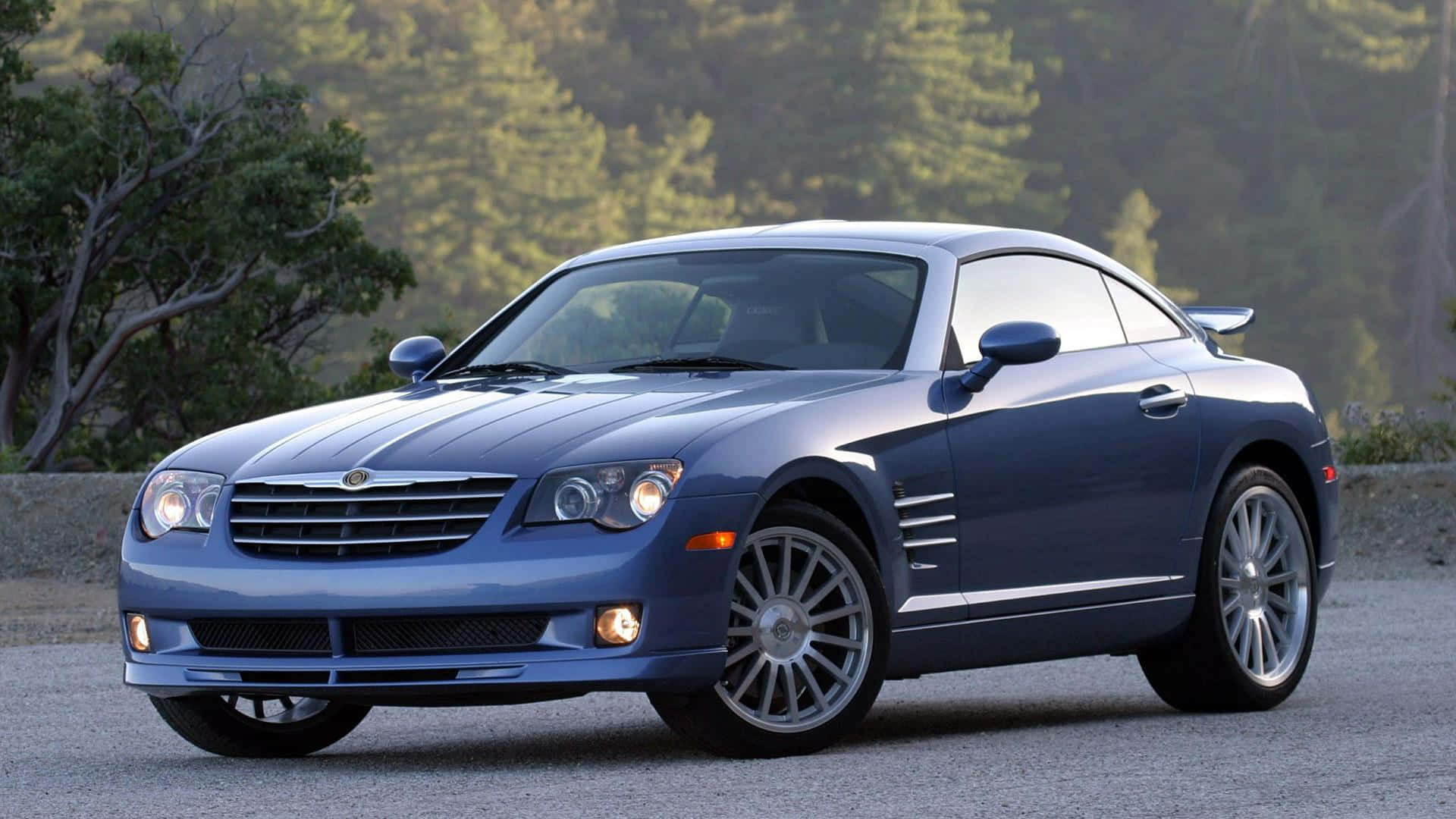 Stunning Red Chrysler Crossfire on a Scenic Drive Wallpaper