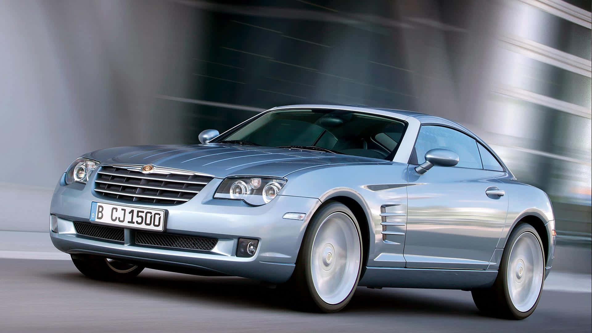 Sleek and Stylish Chrysler Crossfire on the Road Wallpaper