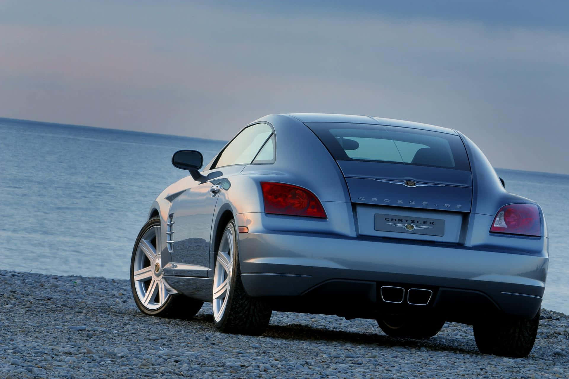 Chrysler Crossfire Luxury Sportscar on the Road Wallpaper