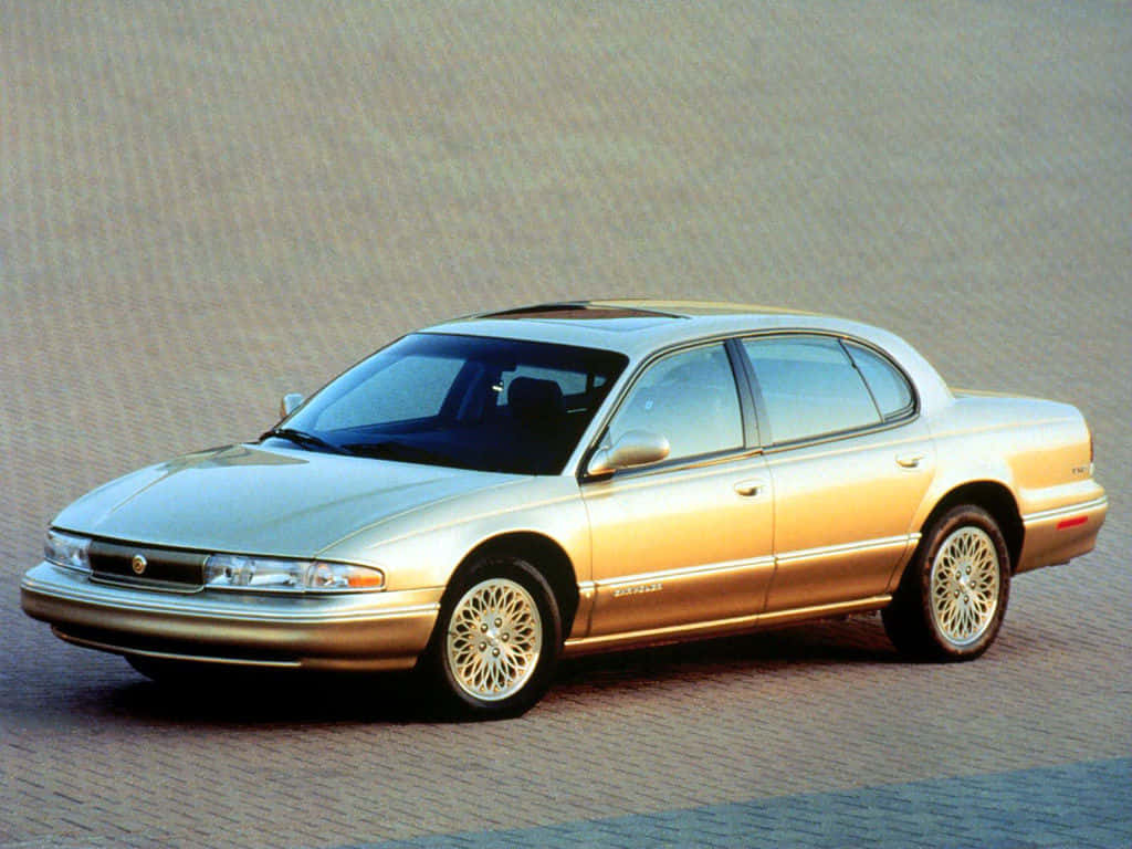 Caption: Elegant Chrysler LHS in a Stunning Landscape Wallpaper