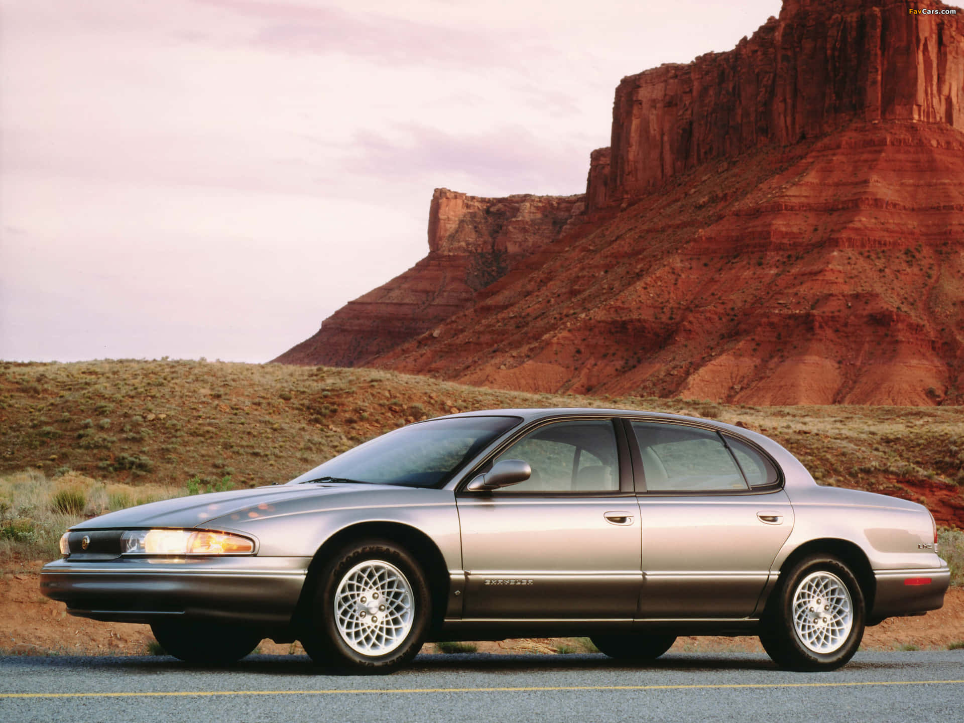 Powerful Elegance - A Chrysler LHS on the Open Road Wallpaper