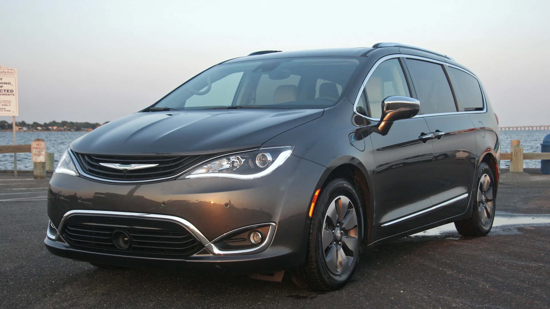 Caption: The Luxurious Chrysler Pacifica on a Scenic Drive Wallpaper
