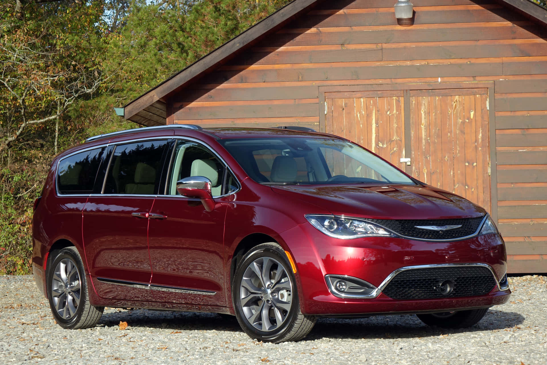 Chrysler Pacifica Parked on a Scenic Road Wallpaper