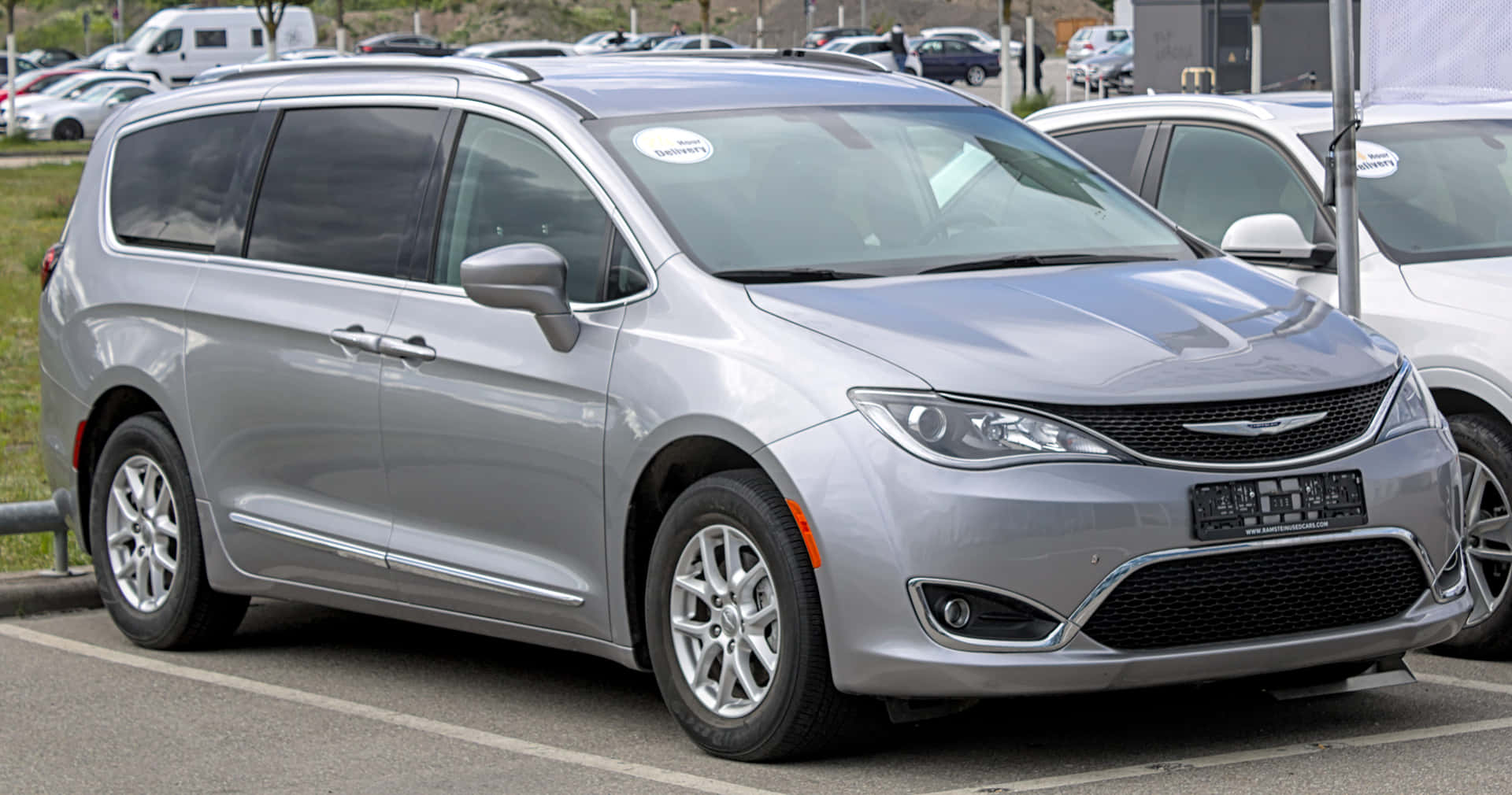 Sleek and Spacious Chrysler Pacifica in action Wallpaper