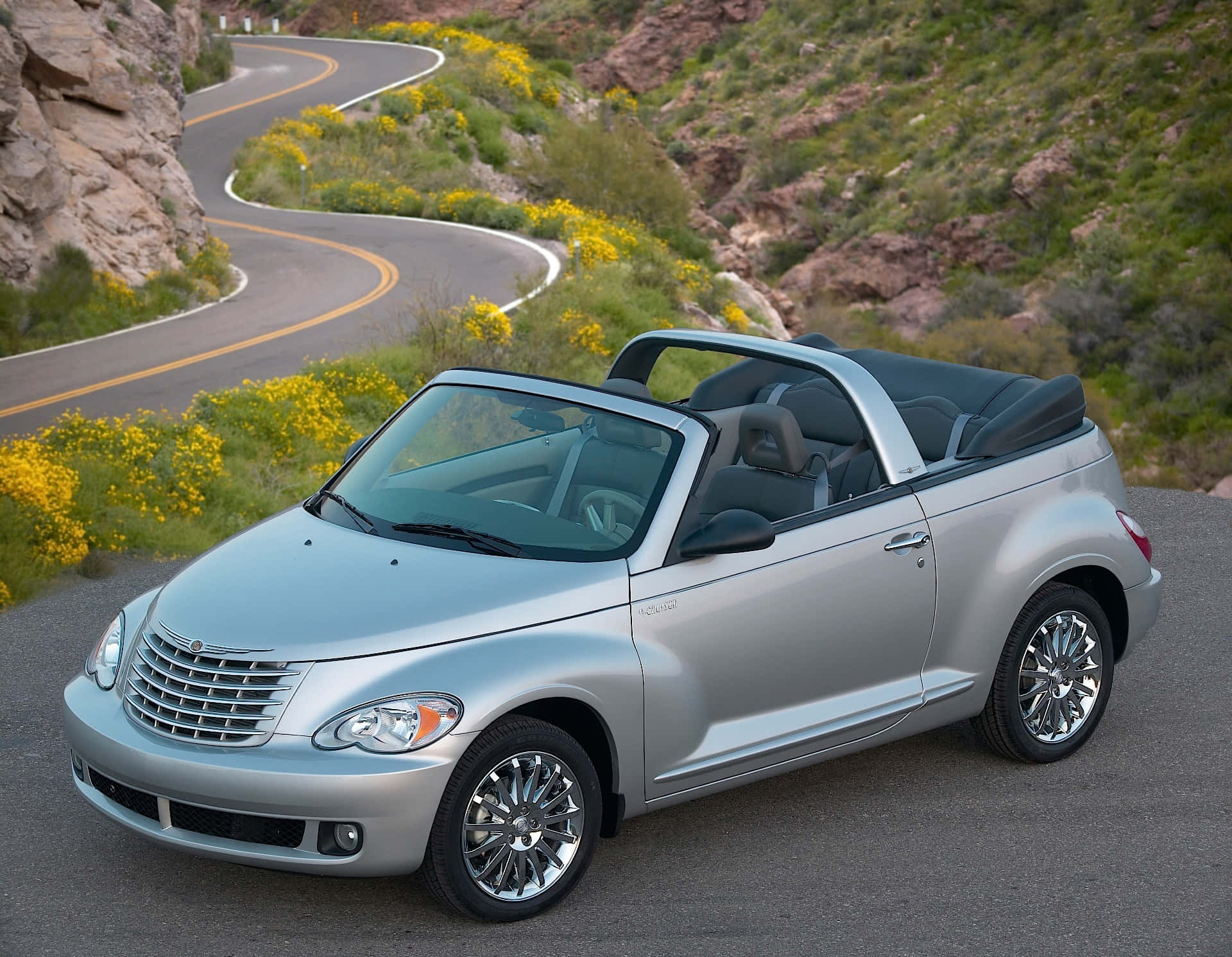 Stunning Chrysler PT Cruiser on a Scenic Road Wallpaper