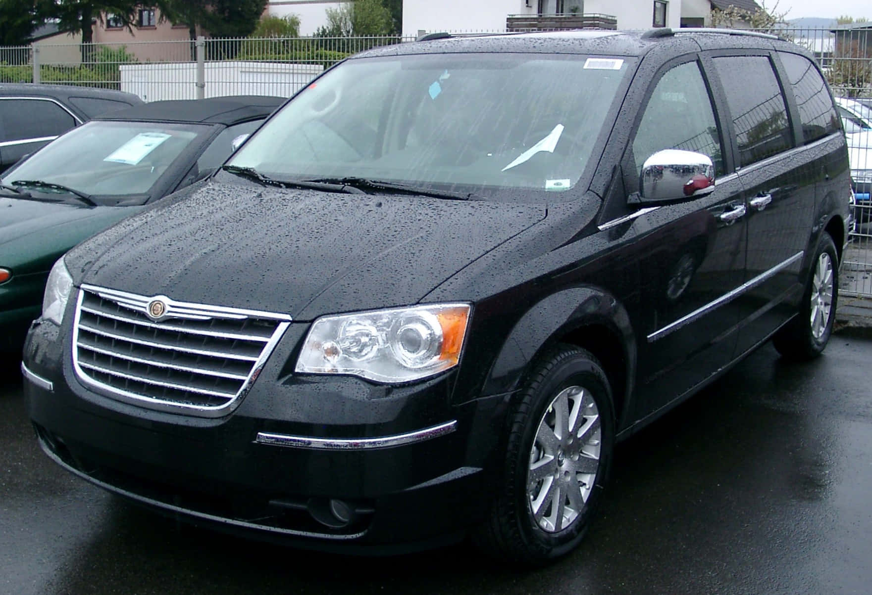 Sleek and Spacious Chrysler Voyager on the Road Wallpaper