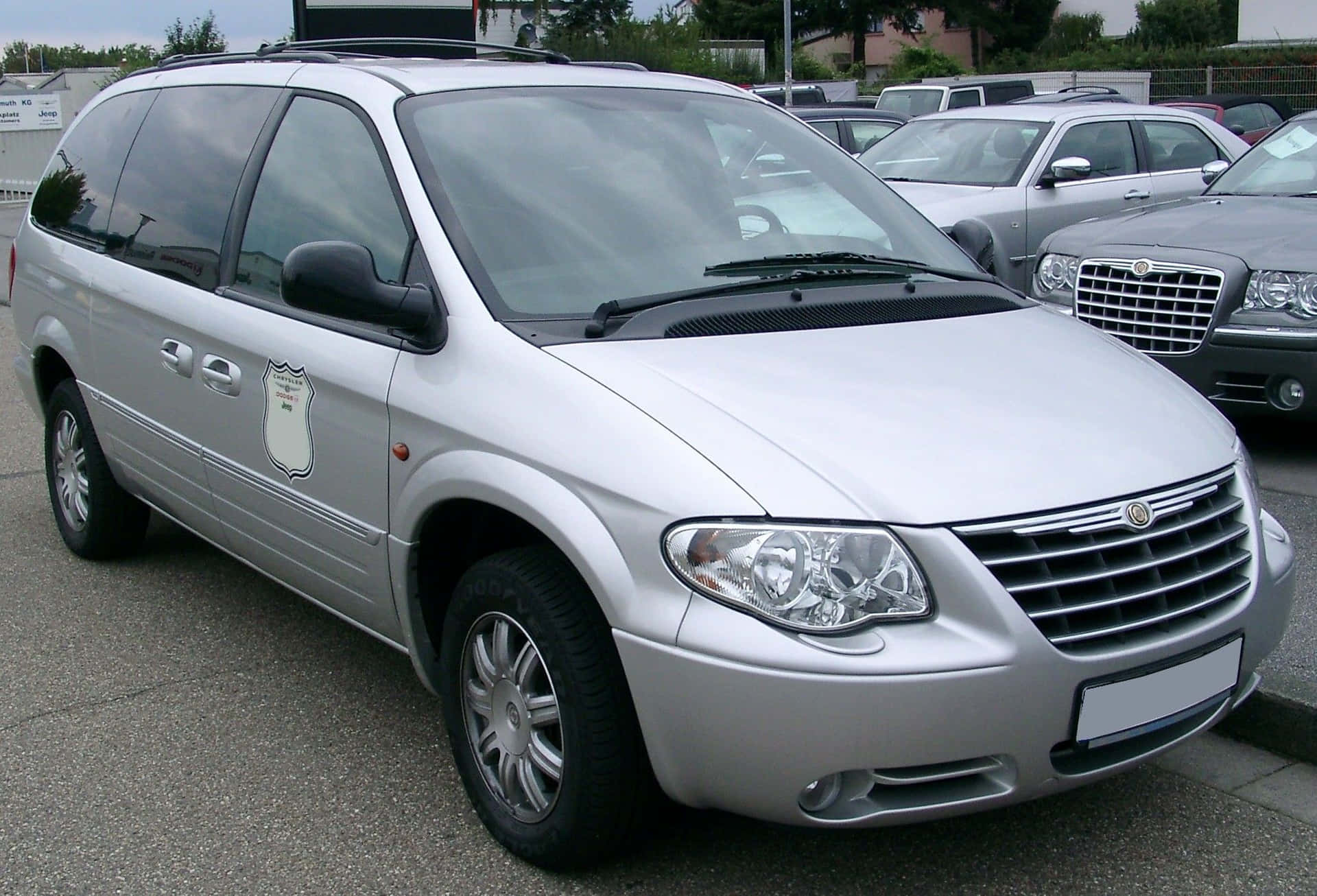 Sleek Chrysler Voyager cruising on the open road Wallpaper