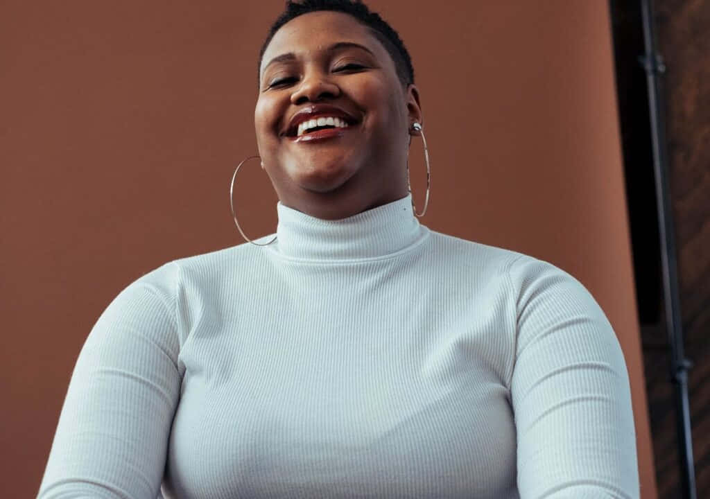 Frohe,übergewichtige Nigerianische Frau Wallpaper