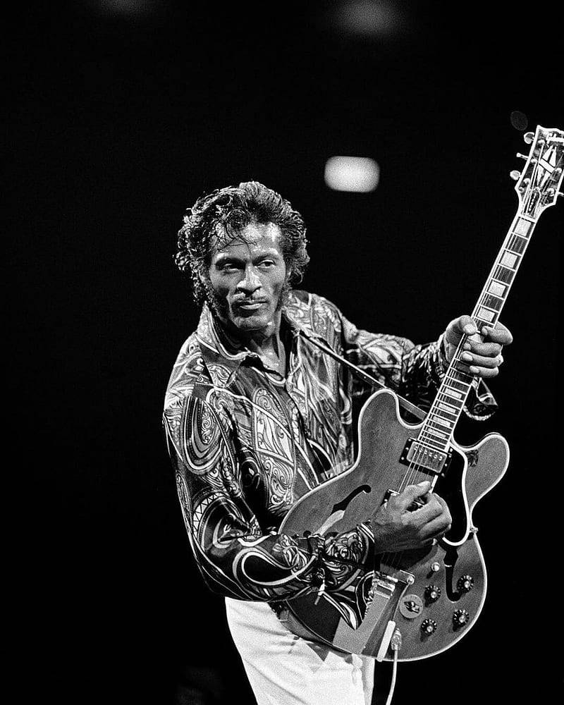 Chuck Berry Bending With Guitar Wallpaper