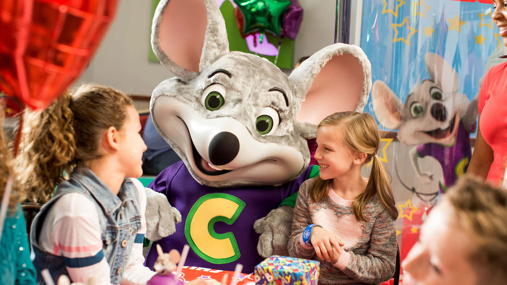 Enjoy mouth-watering pizza, drinks, and games at Chuck E Cheese