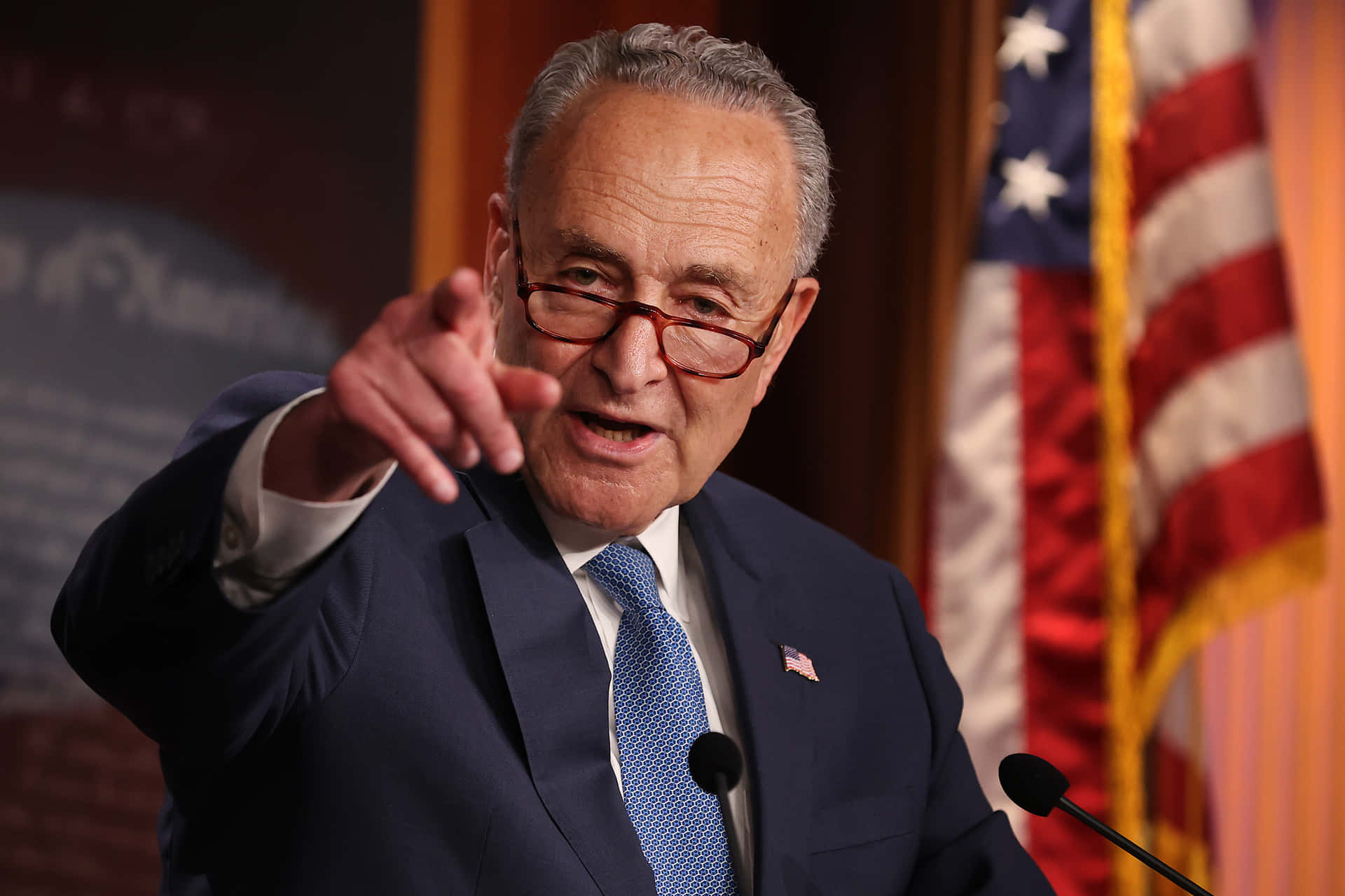 Download Chuck Schumer Speakingwith Gesture Wallpaper | Wallpapers.com