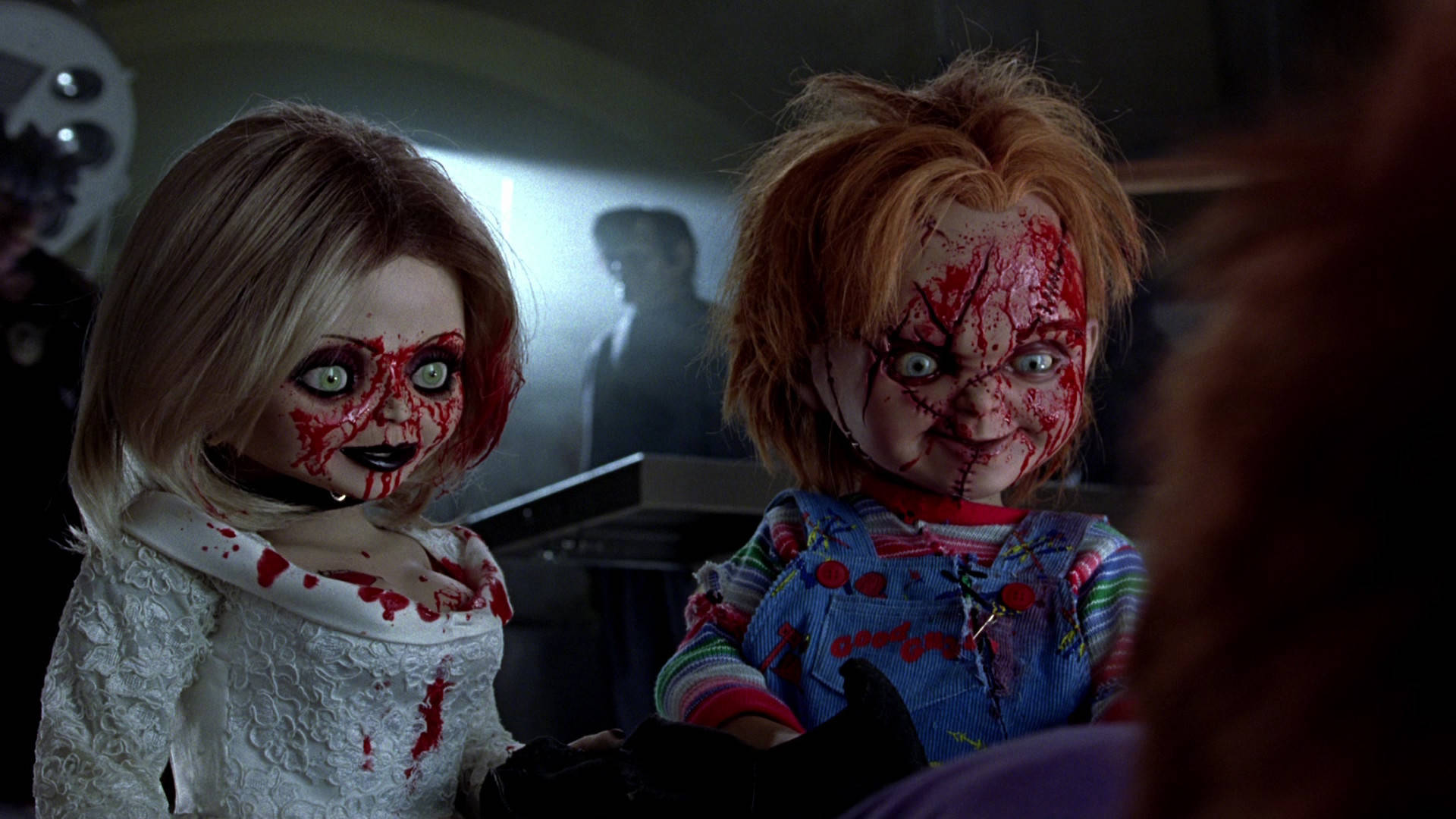 Chucky And Tiffany Bloody Faces Wallpaper