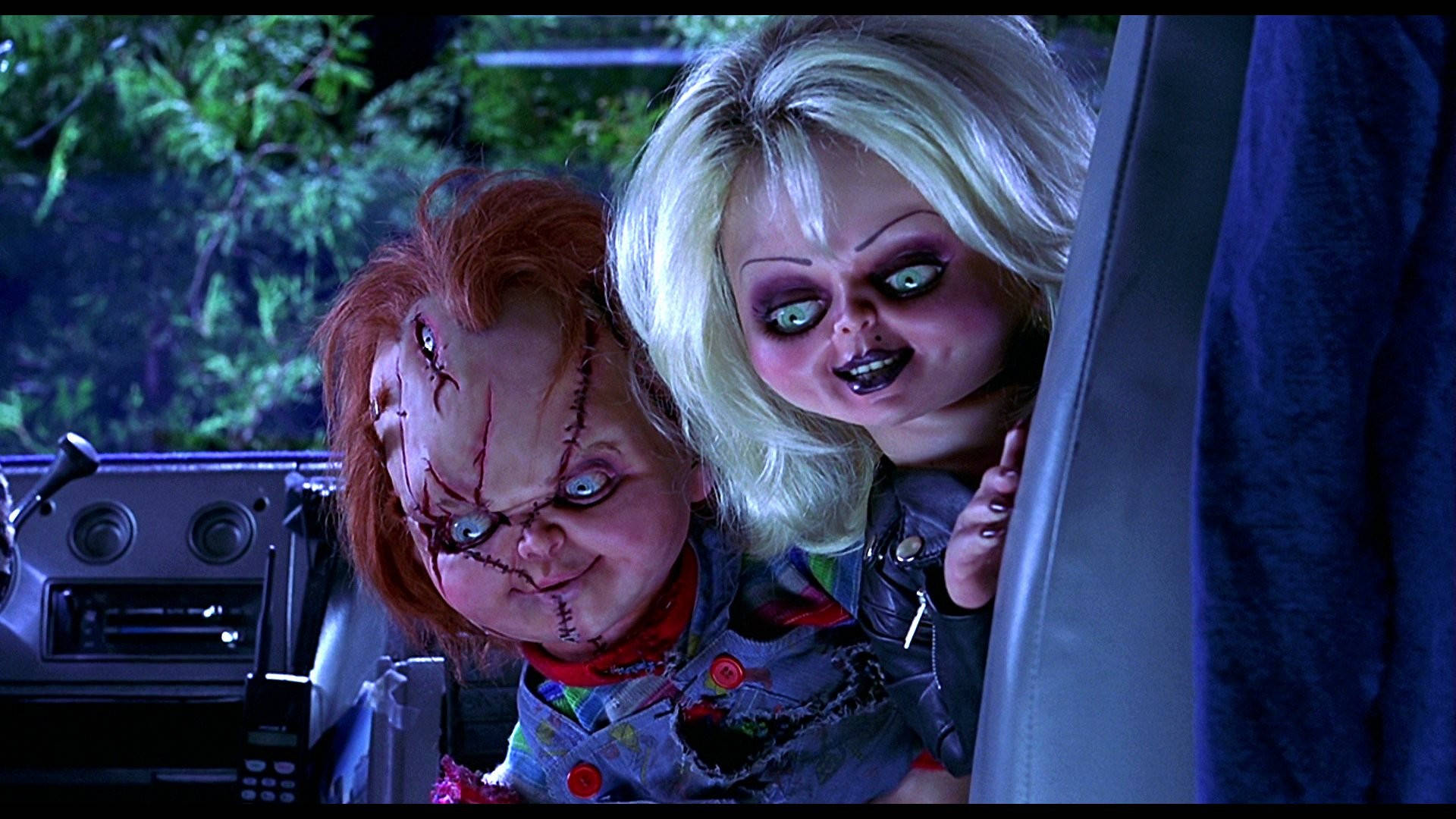 Chucky And Tiffany In Car Background