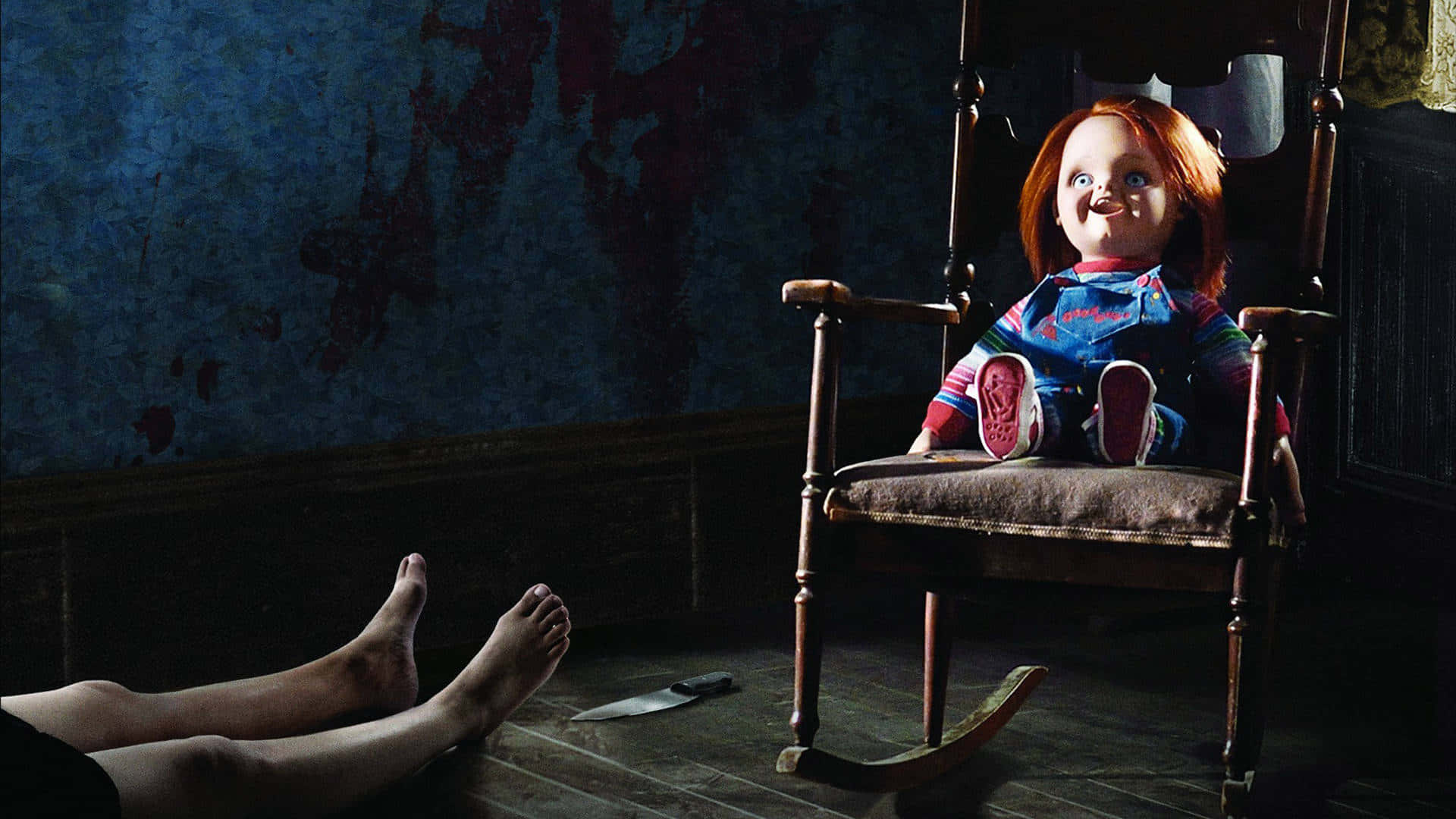 Chucky Doll On A Rocking Chair Wallpaper