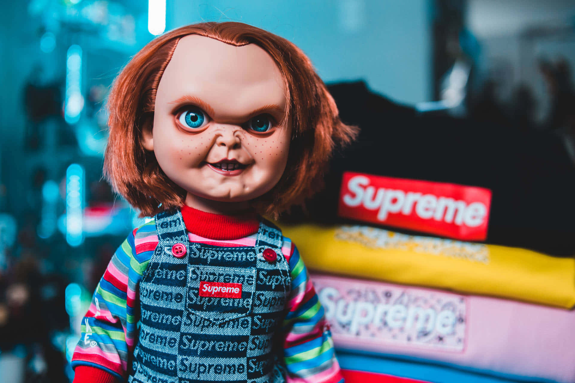 Download Chucky Doll In Supreme Overalls Wallpaper | Wallpapers.com