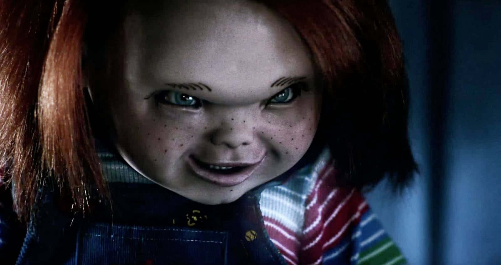 Chucky Doll Grinning During A Fight Wallpaper