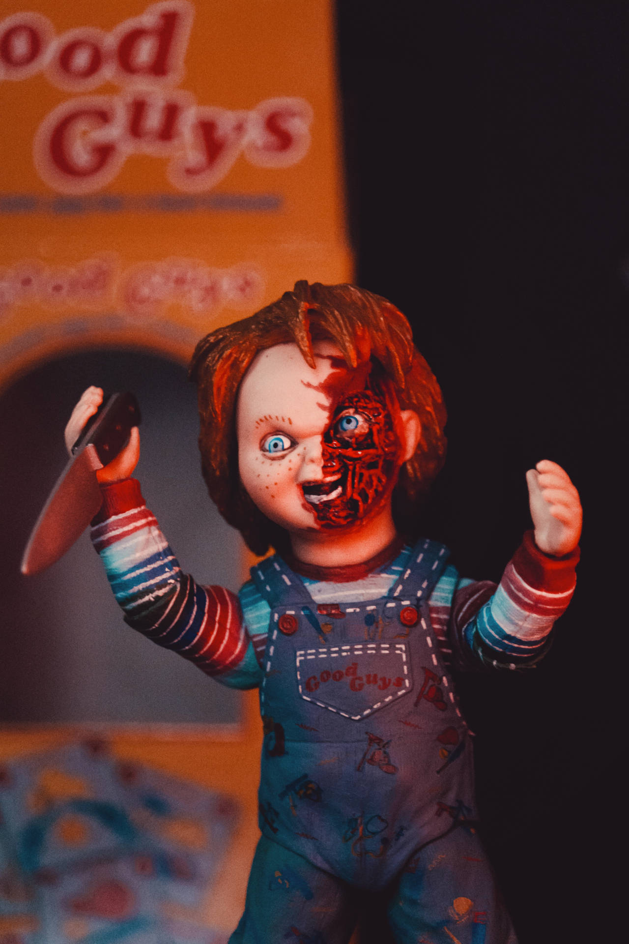 Chucky Figure Half Burned Face Background