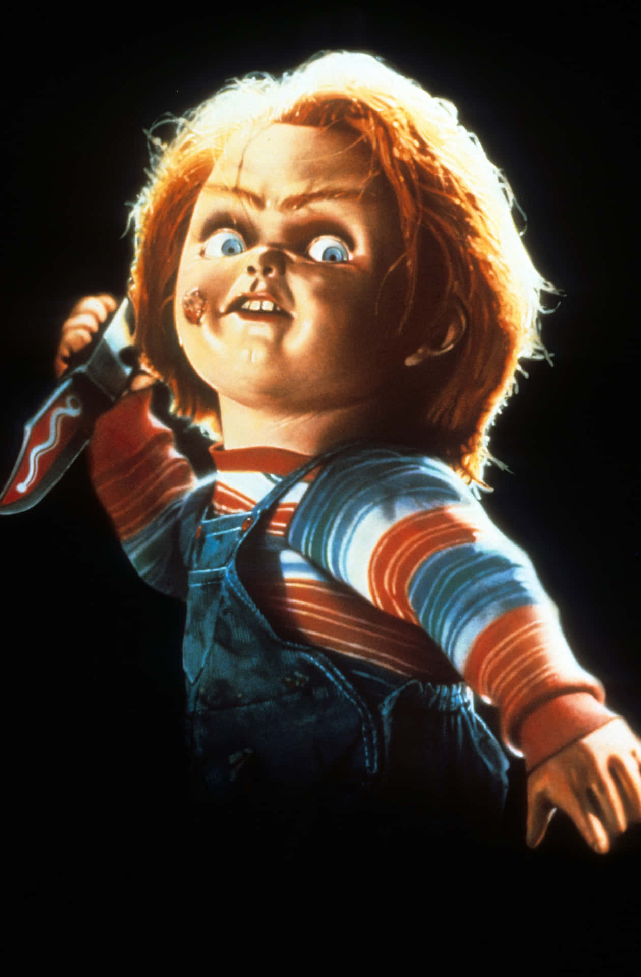 Chucky, The Infamous Horror Doll In A Menacing Pose