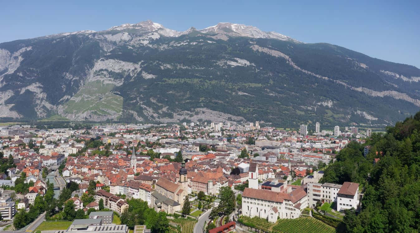 Chur Cityscapewith Mountain Backdrop Wallpaper