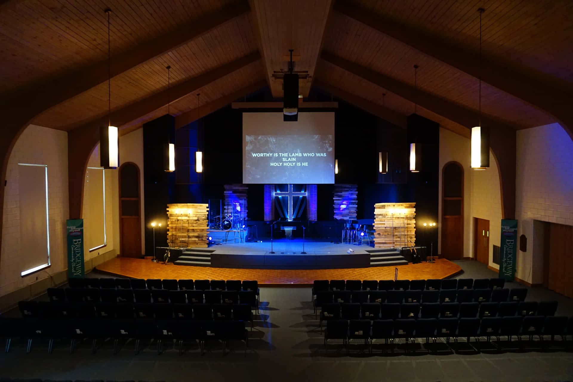 A Church With A Large Stage And A Large Screen