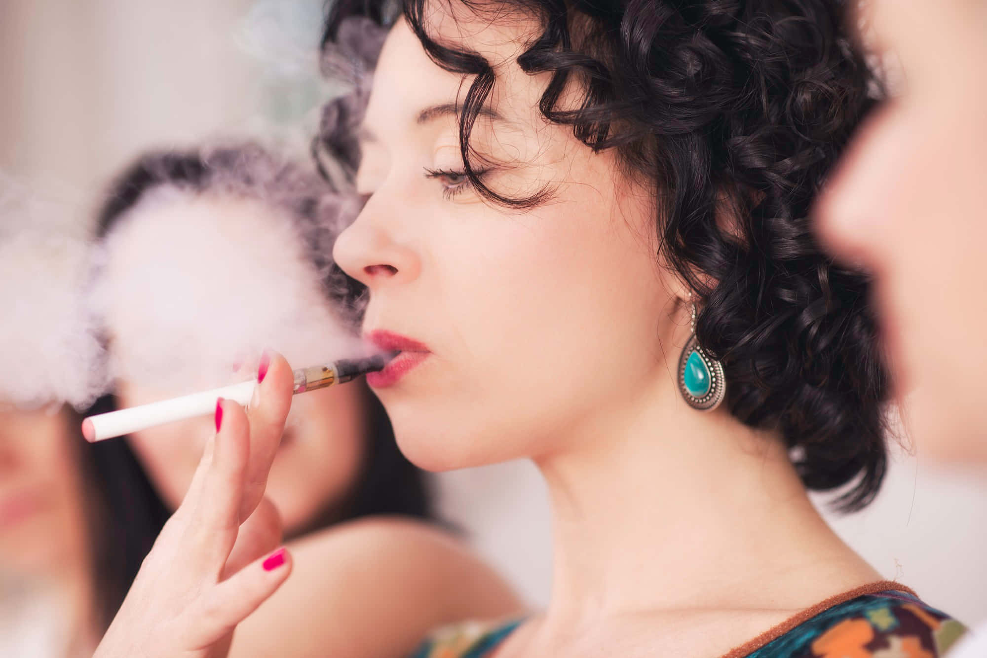 Electric Cigarette Women With Curly Hair Picture