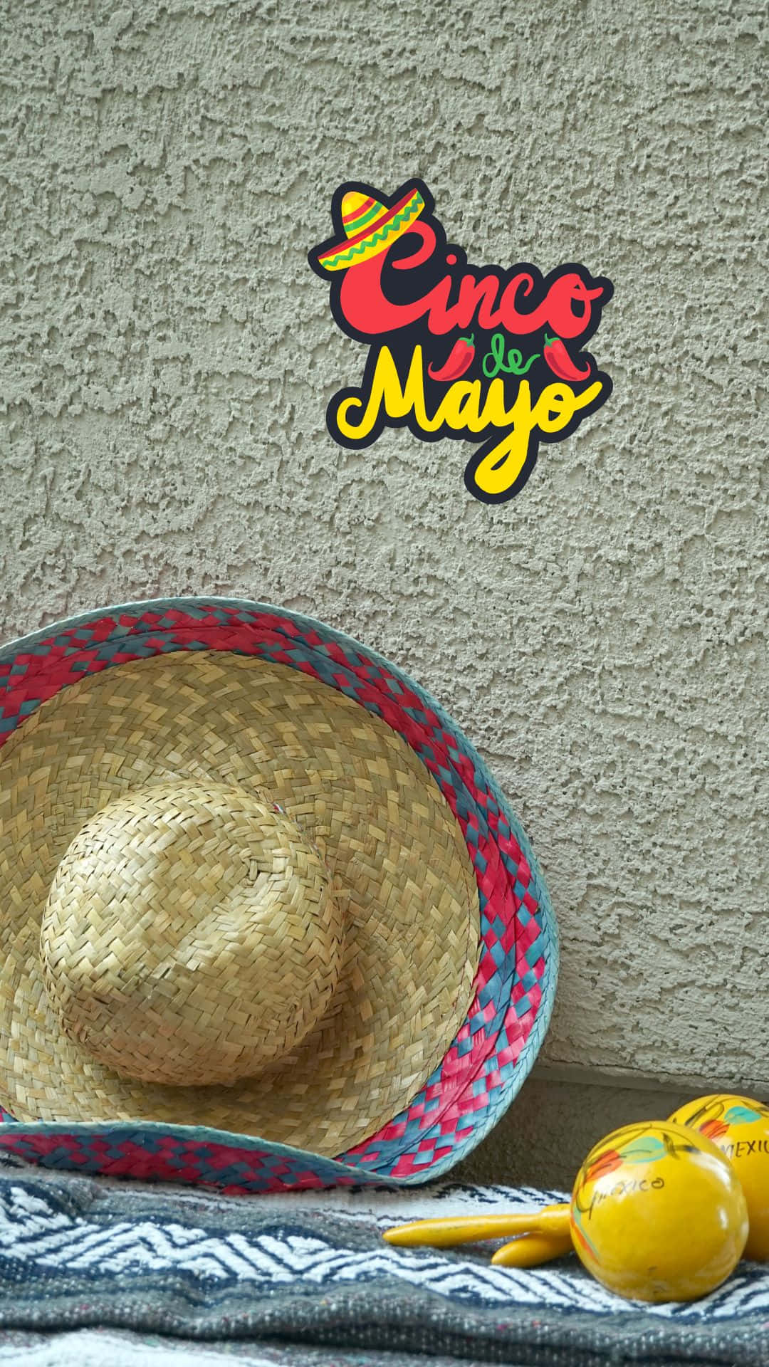A Hat And A Tequila Bottle On A Table Wallpaper