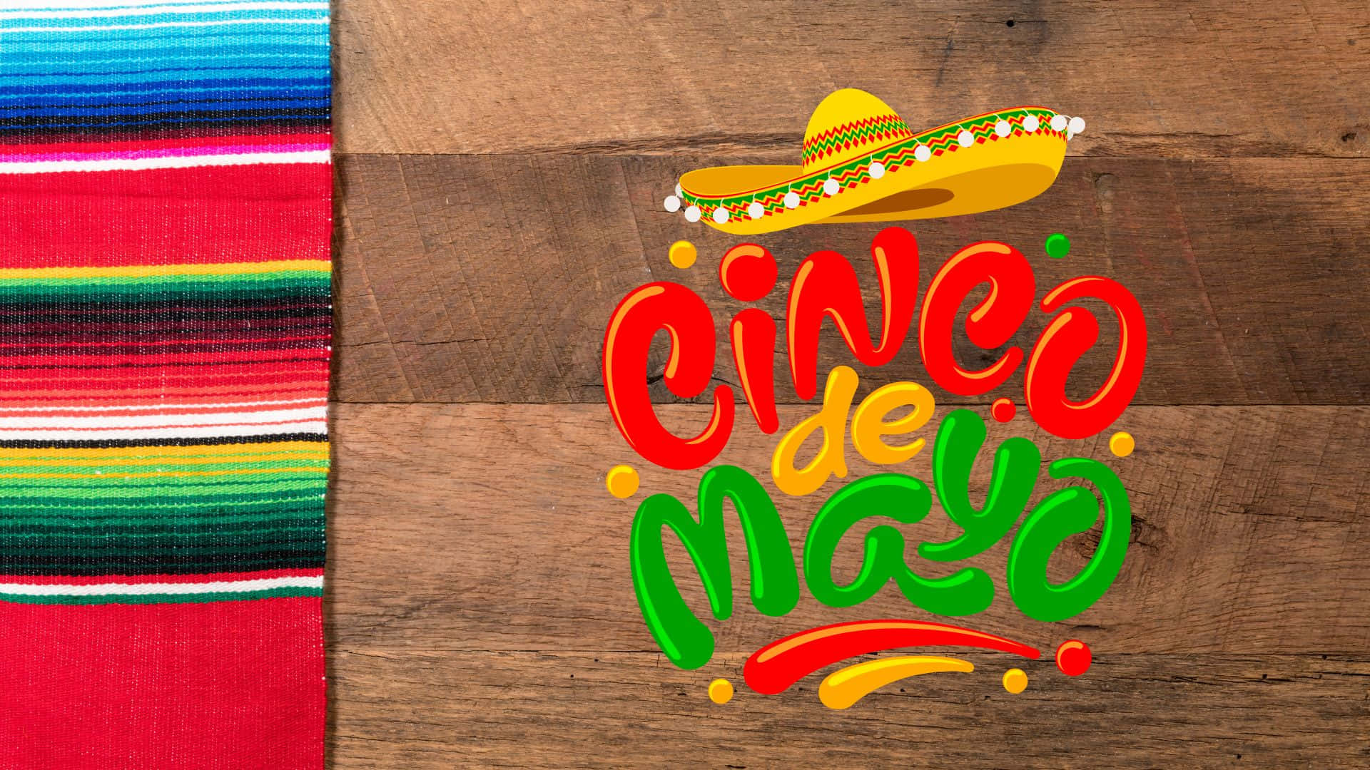 Einmexikanischer Hut Und Eine Mexikanische Decke Auf Einem Holztisch Wallpaper