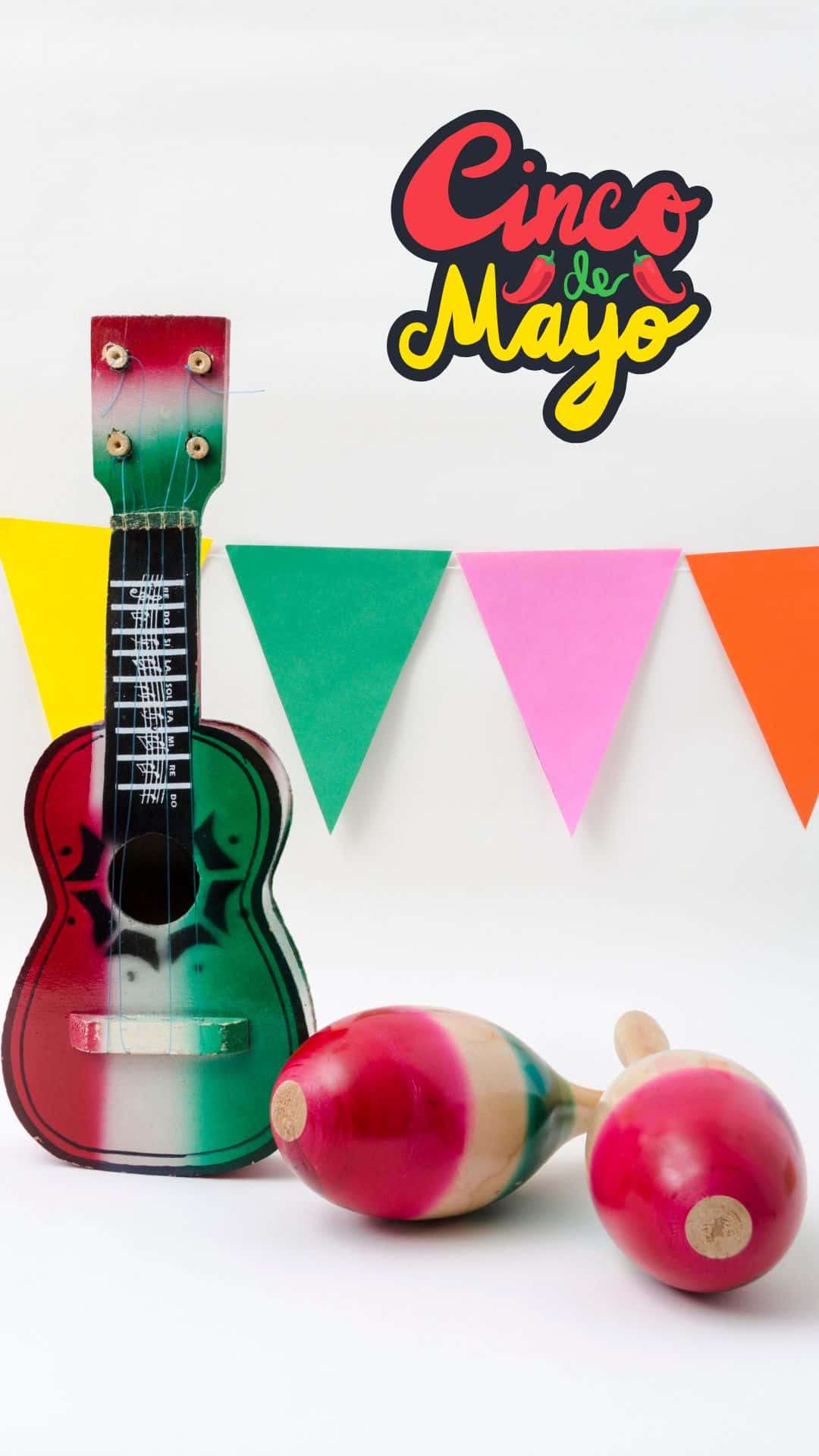 A Wooden Ukulele And Maracas Are On A Table Wallpaper