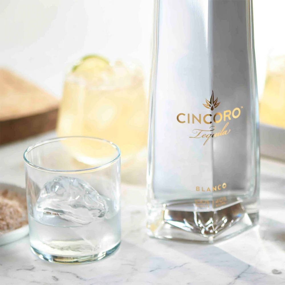 Cincoro Tequila Blanco And Glass With Ice Wallpaper