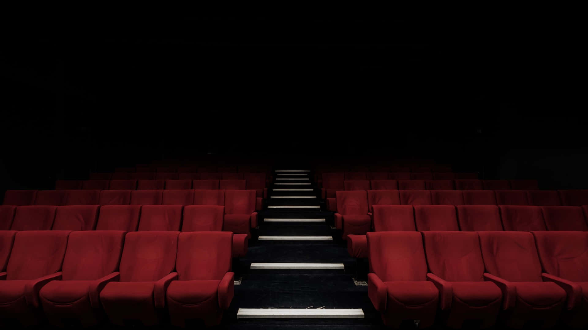 Empty Cinema Seats With A Staircase Wallpaper