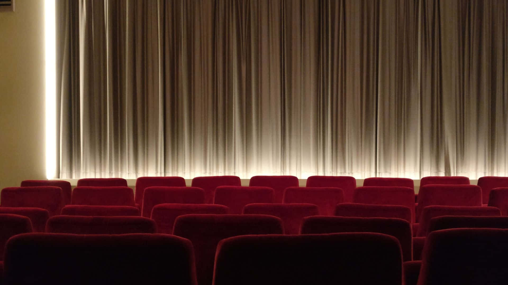 Cinema Interior Empty Seatsand Screen Wallpaper