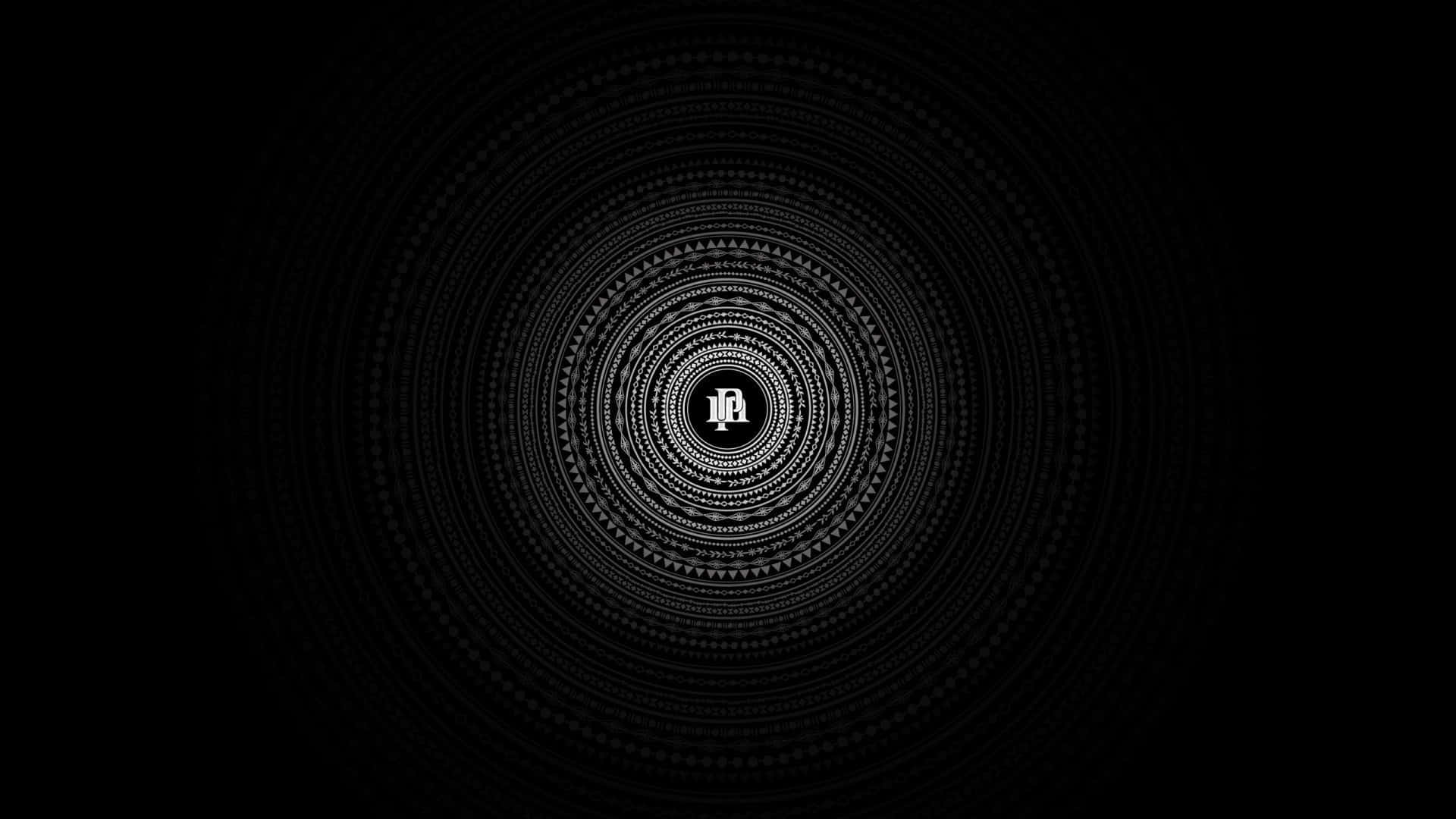A Black Background With A Circular Pattern