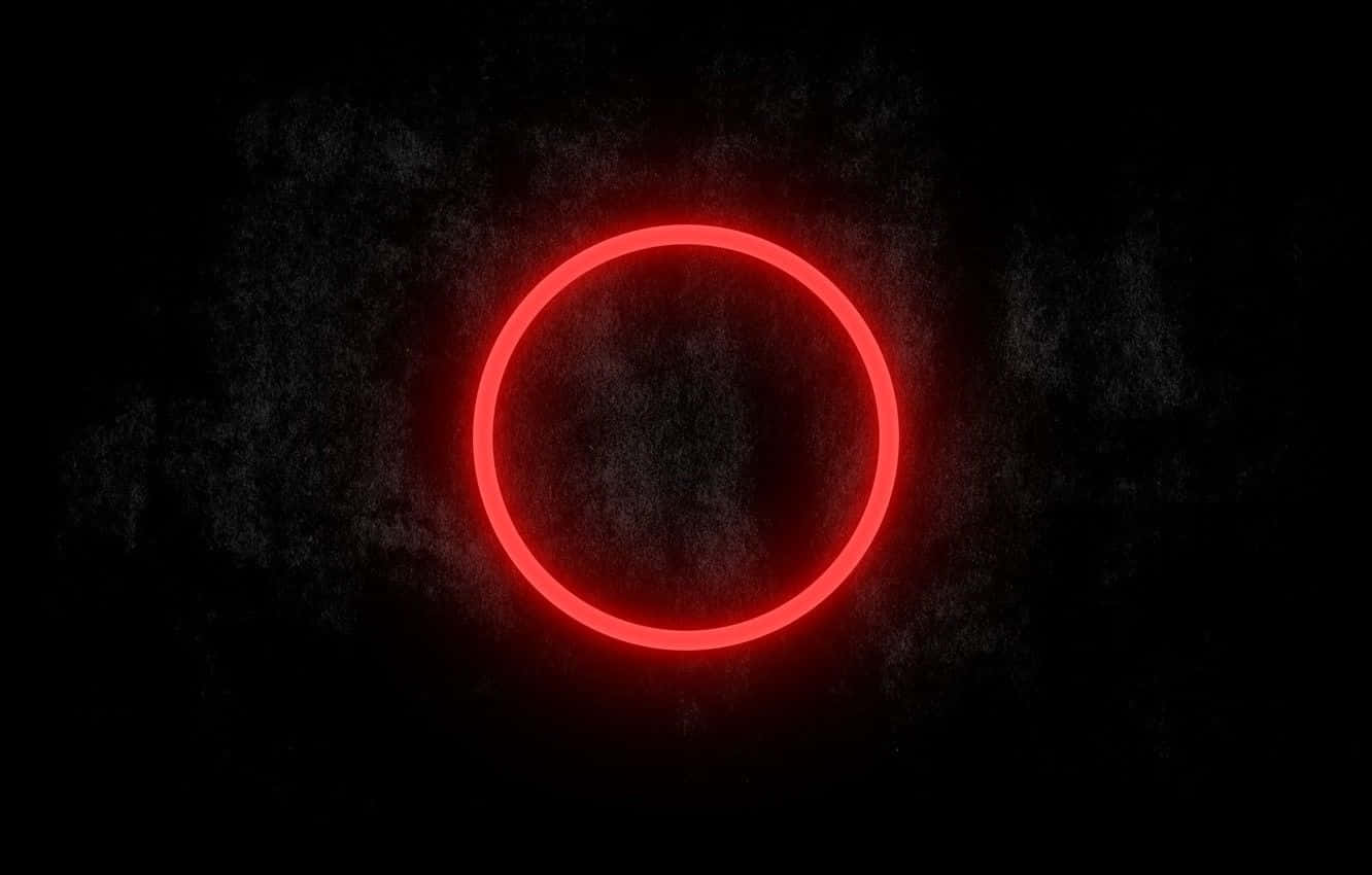 A Red Circle On A Black Background