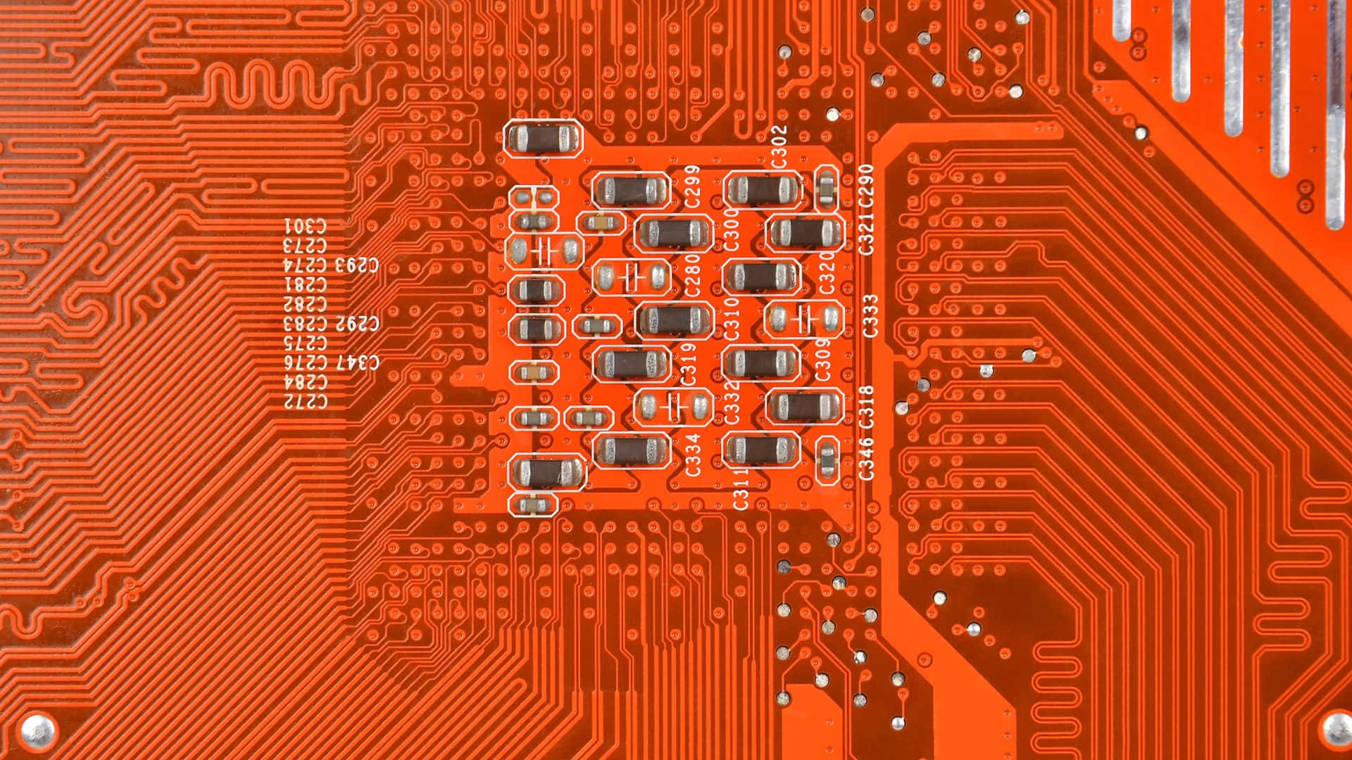 The tiny pathways of a circuit board.