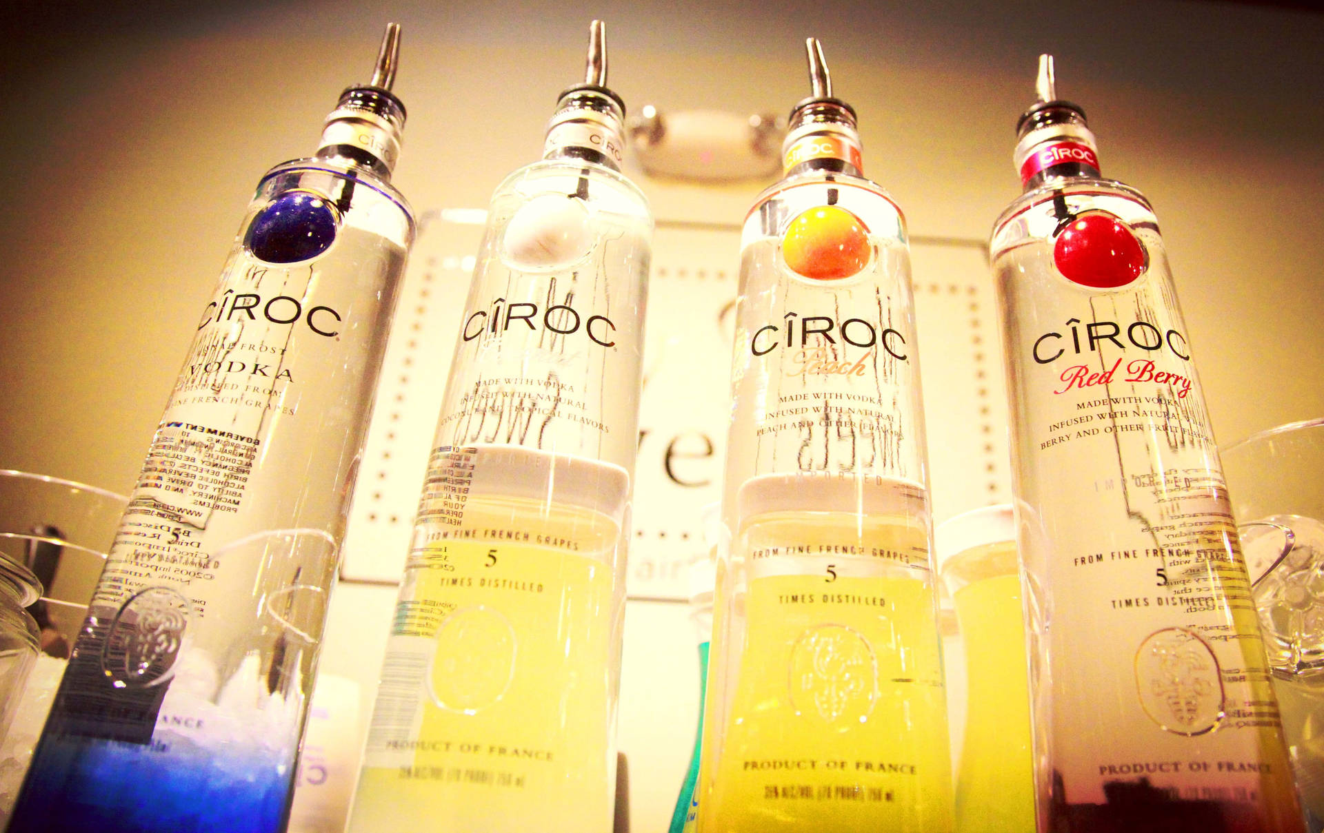 A selection of Ciroc French Vodka Flavors: Coconut, Peach, and Red Berry. Wallpaper