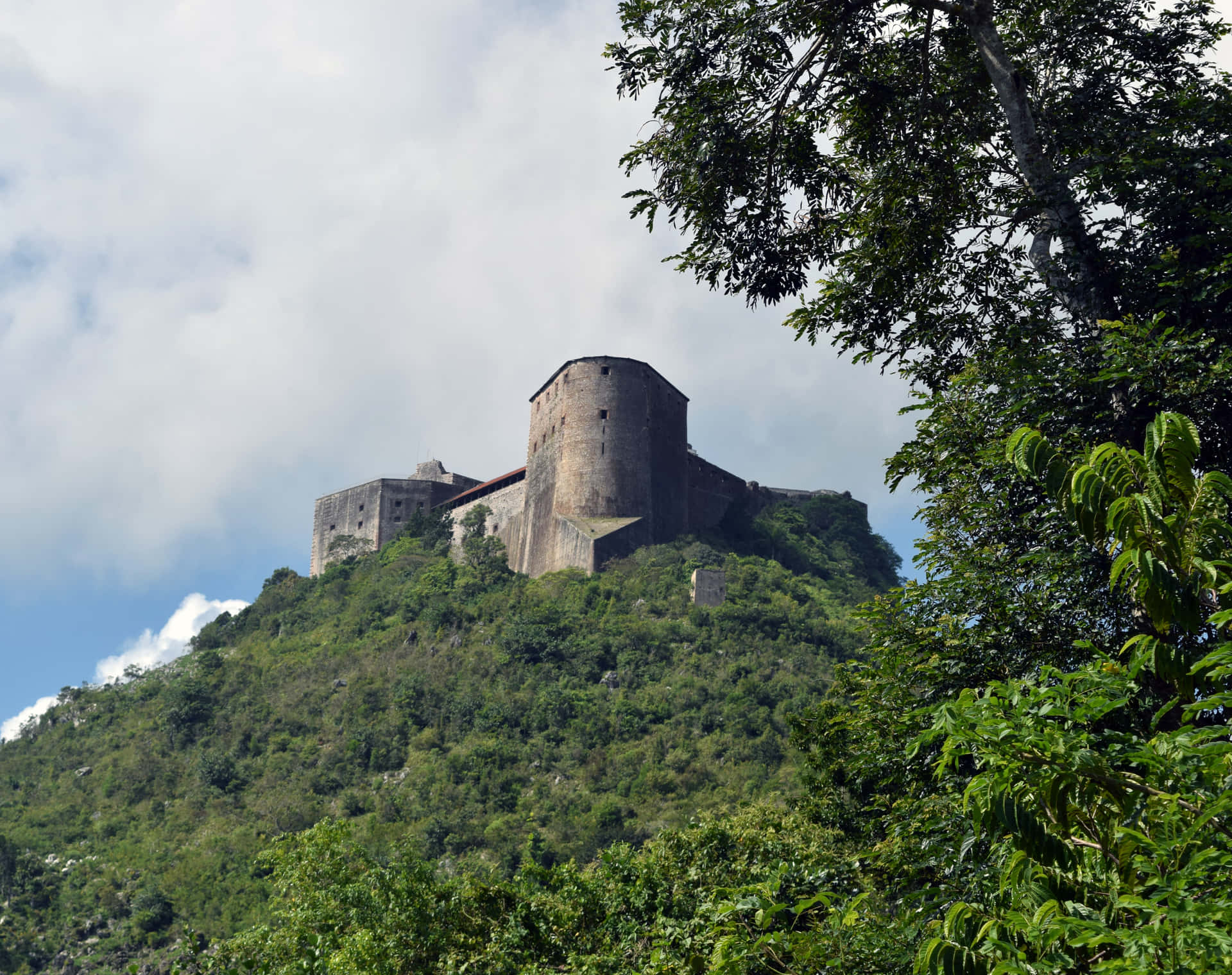 "A view of the majestic Citadelle Laferriere atop a hill in Haiti" Wallpaper