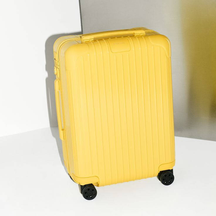 Citron Yellow Rimowa Suitcase Wallpaper