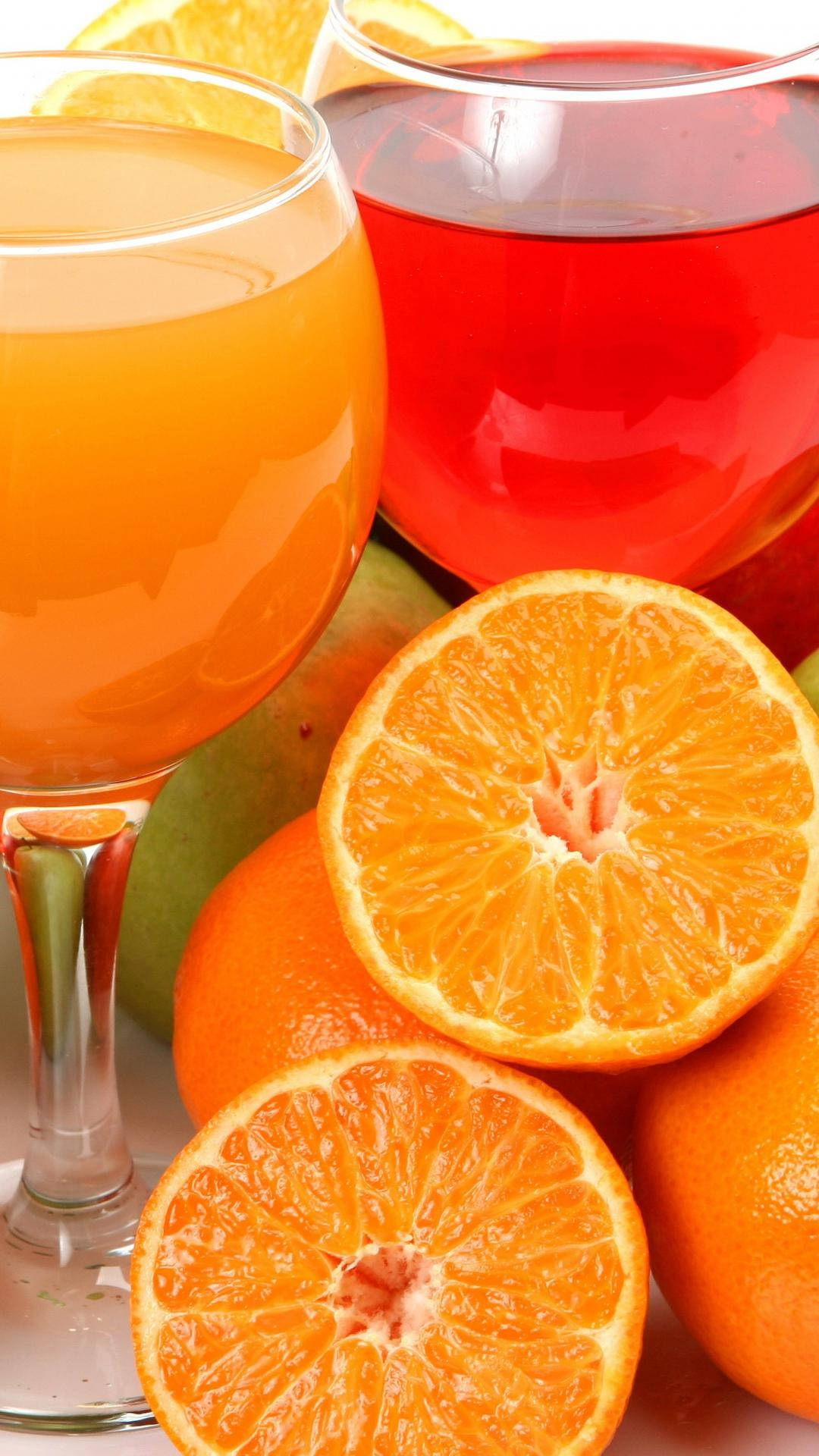Citrusgrapefruitskivor Och Juice. Wallpaper