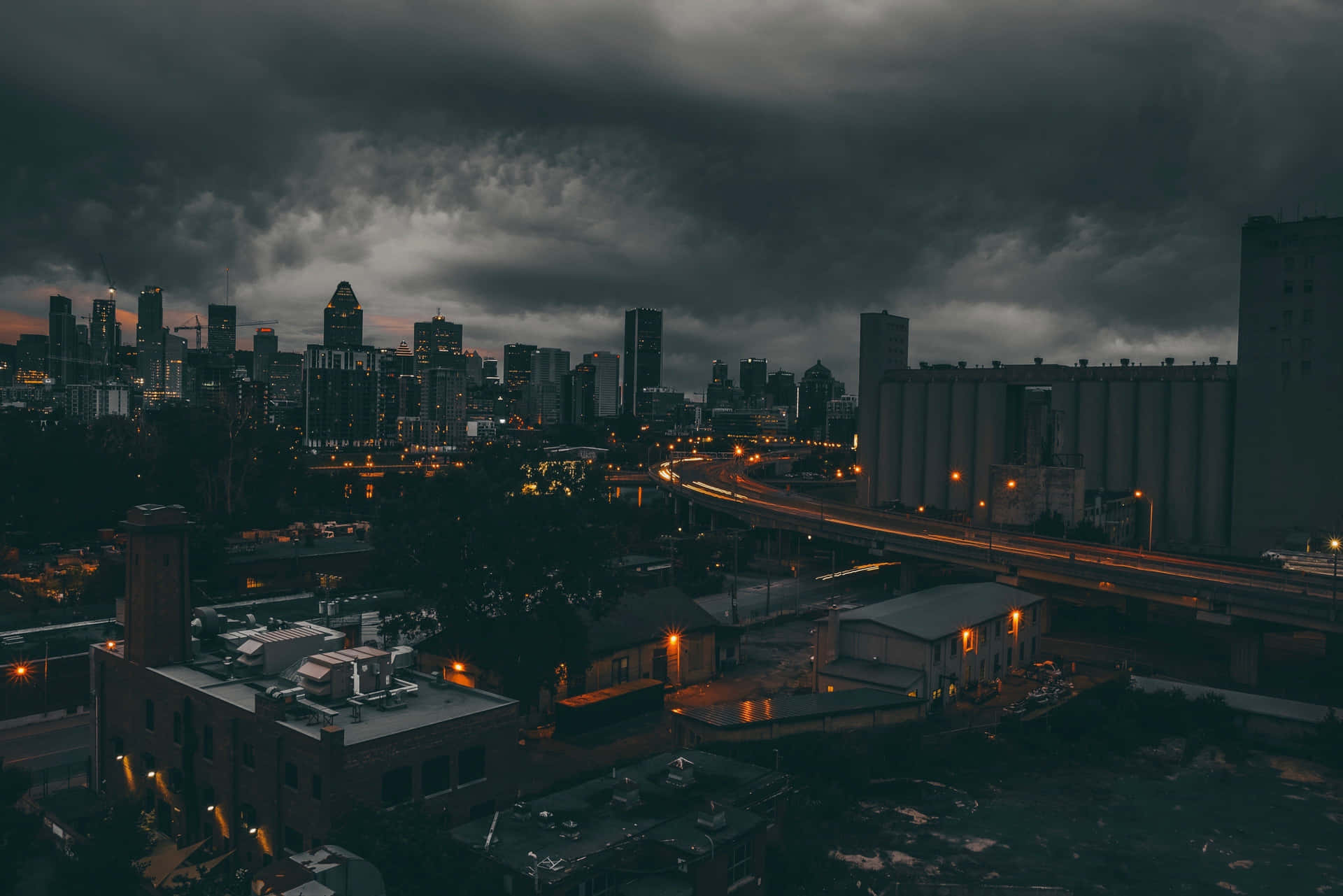 Dark Clouds In The City Desktop Wallpaper