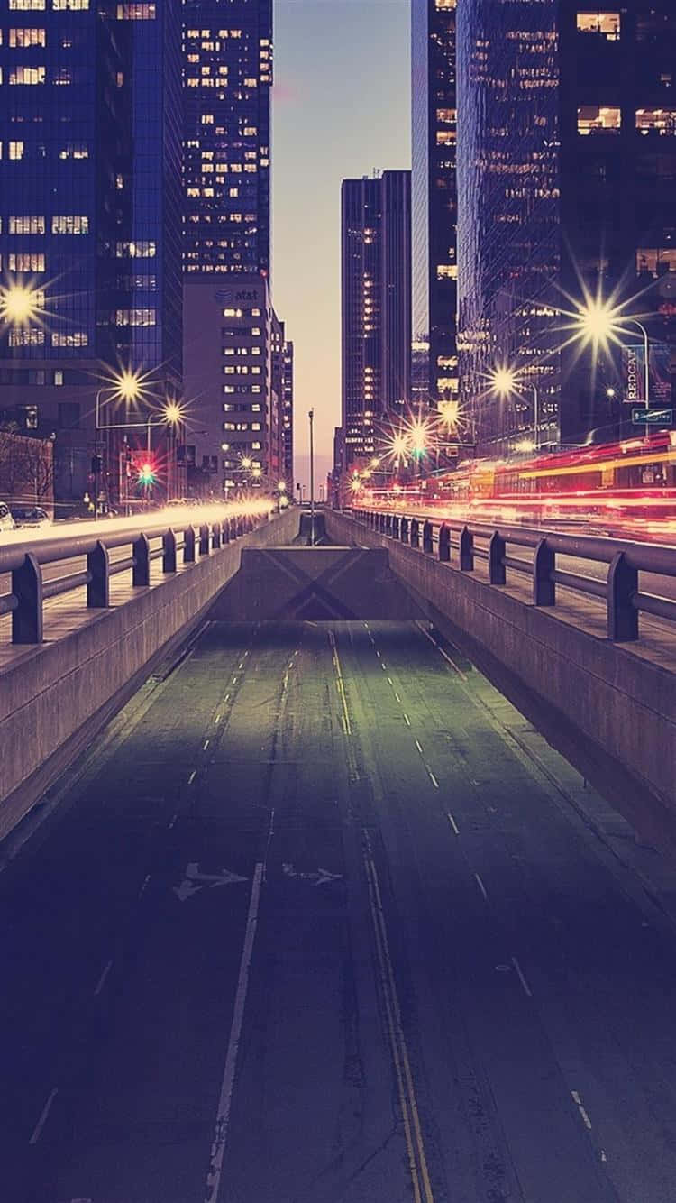 City life glows in the night with iPhone Wallpaper