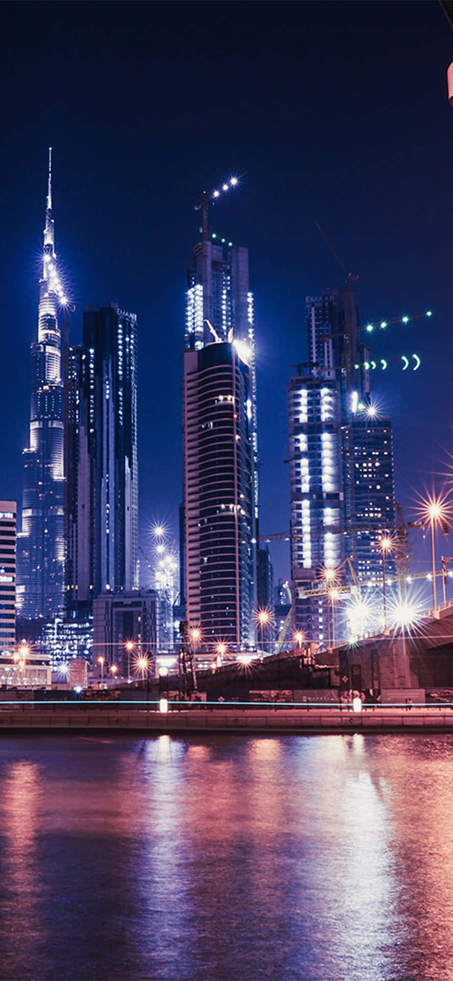 Night View Dubai City Iphone Low Angle Shot Wallpaper