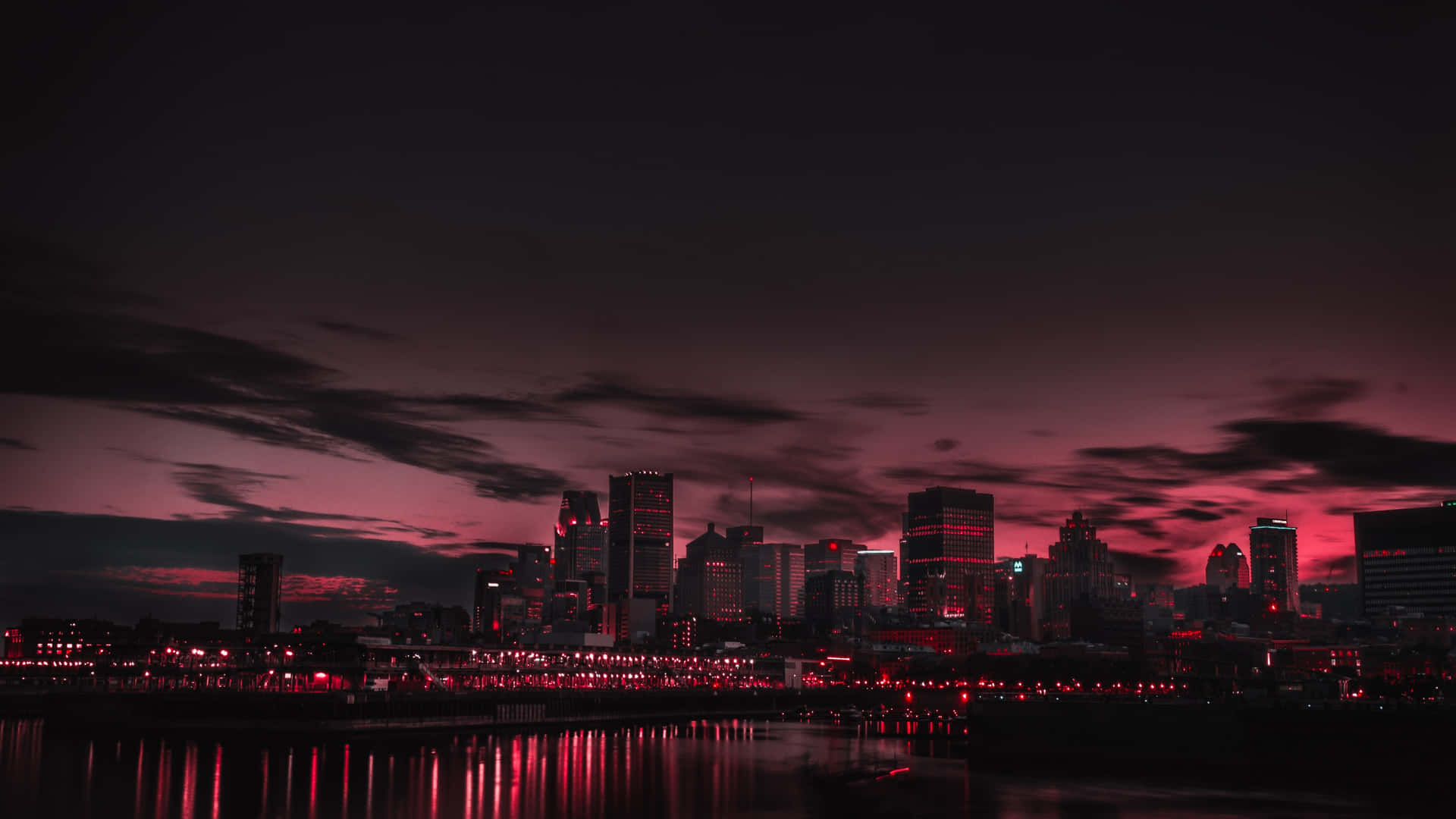 A City Skyline With Red Lights